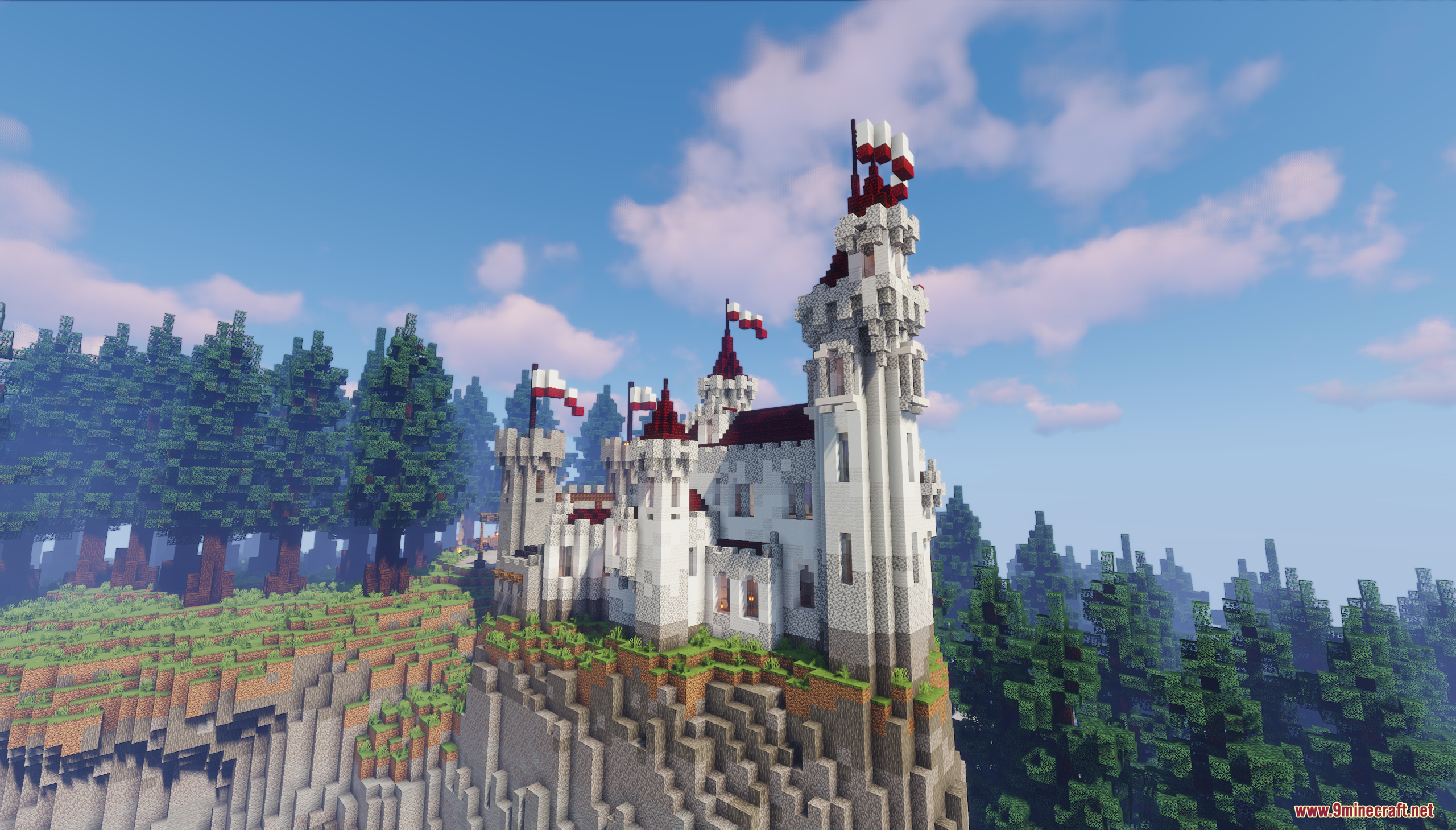 The white castle with red flags on a cliff