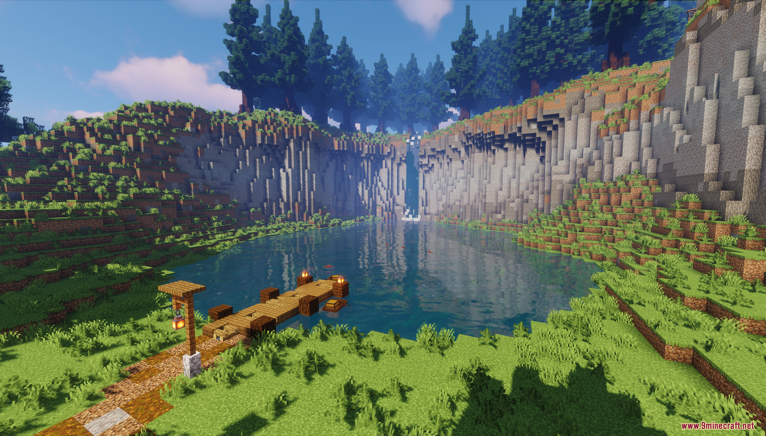 A small wooden dock on a peaceful cliffside lake
