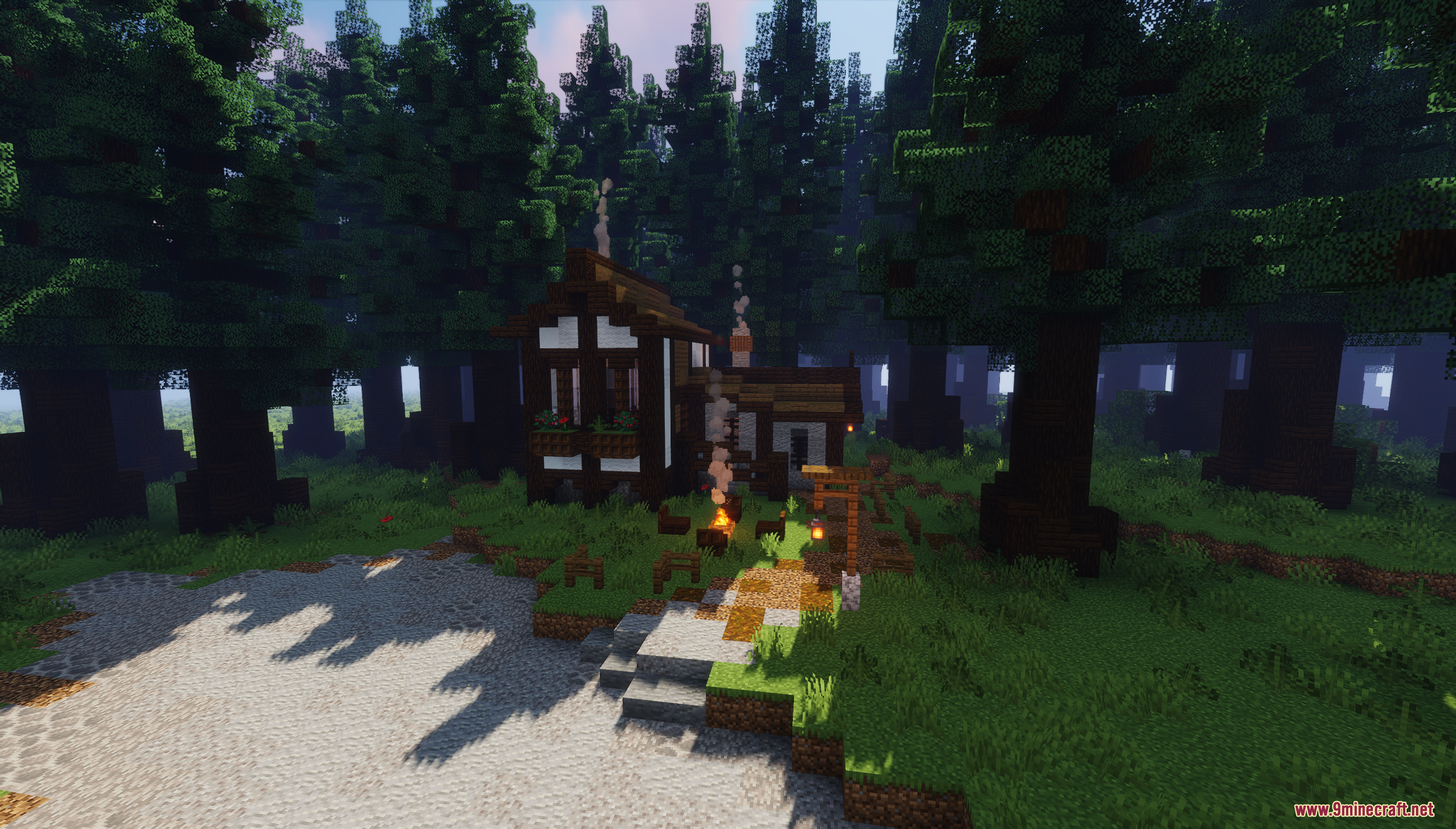 A small rustic house with a campfire in the woods