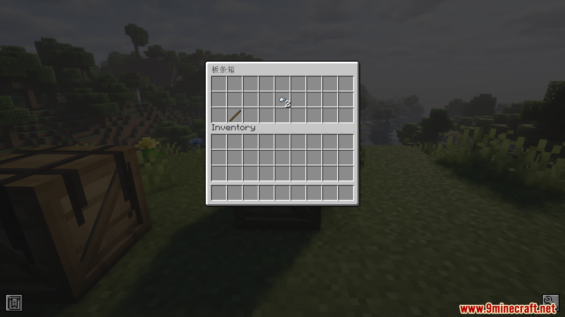 Player looting a wooden crate for a stick and paper