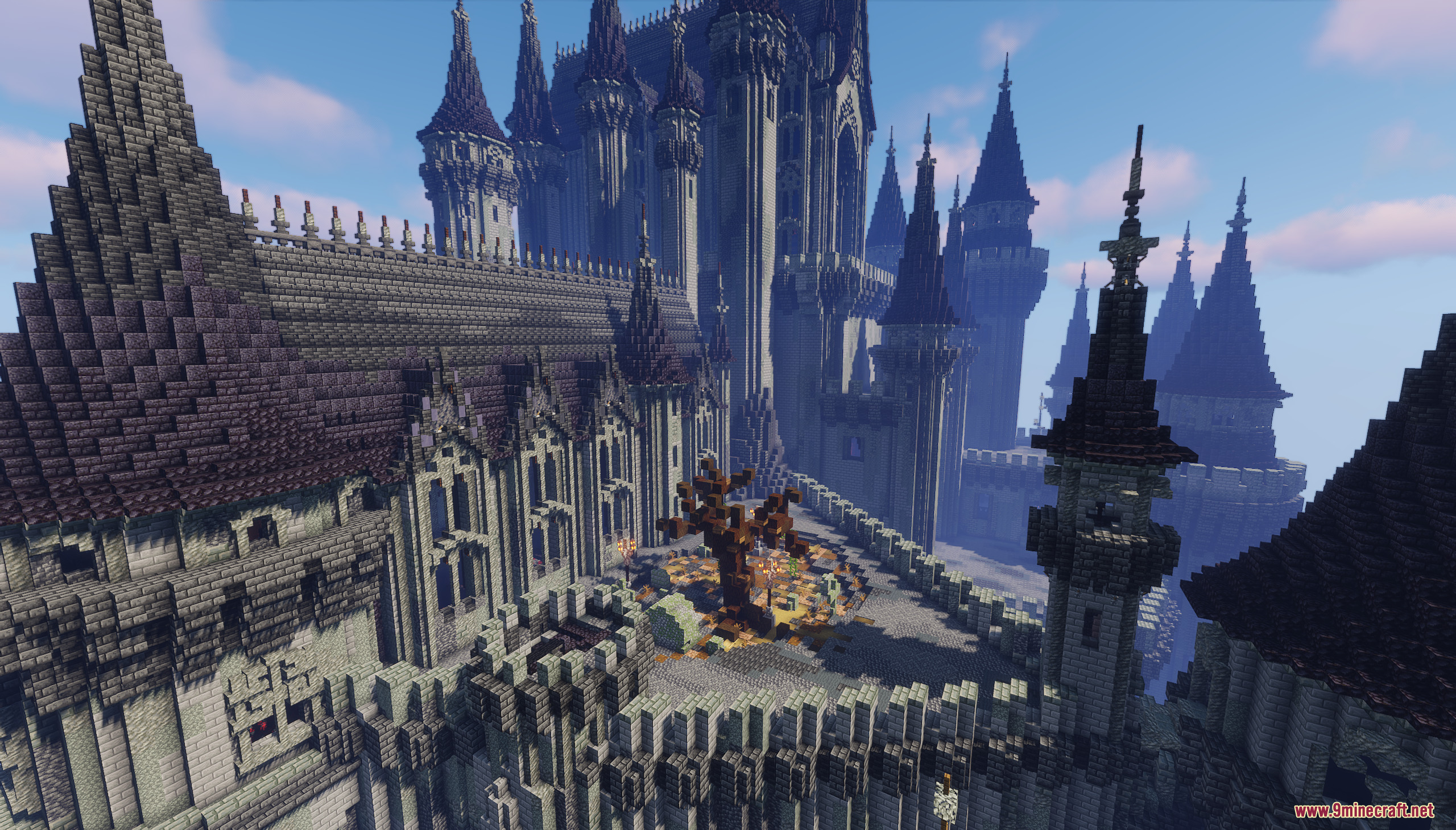 Massive gothic stone castle featuring tall dark spires and a central courtyard