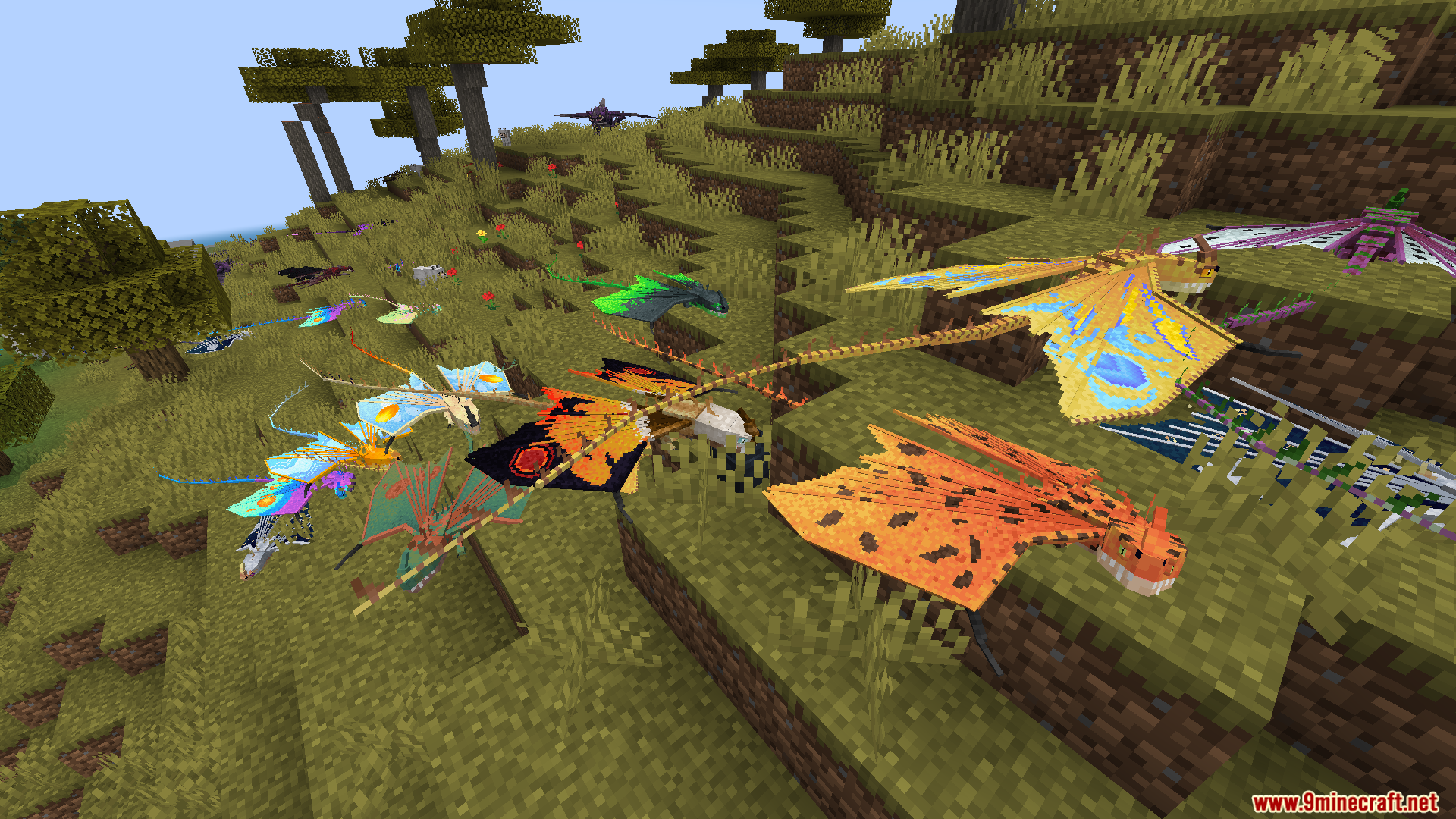 A large group of colorful dragons resting on a grassy hill
