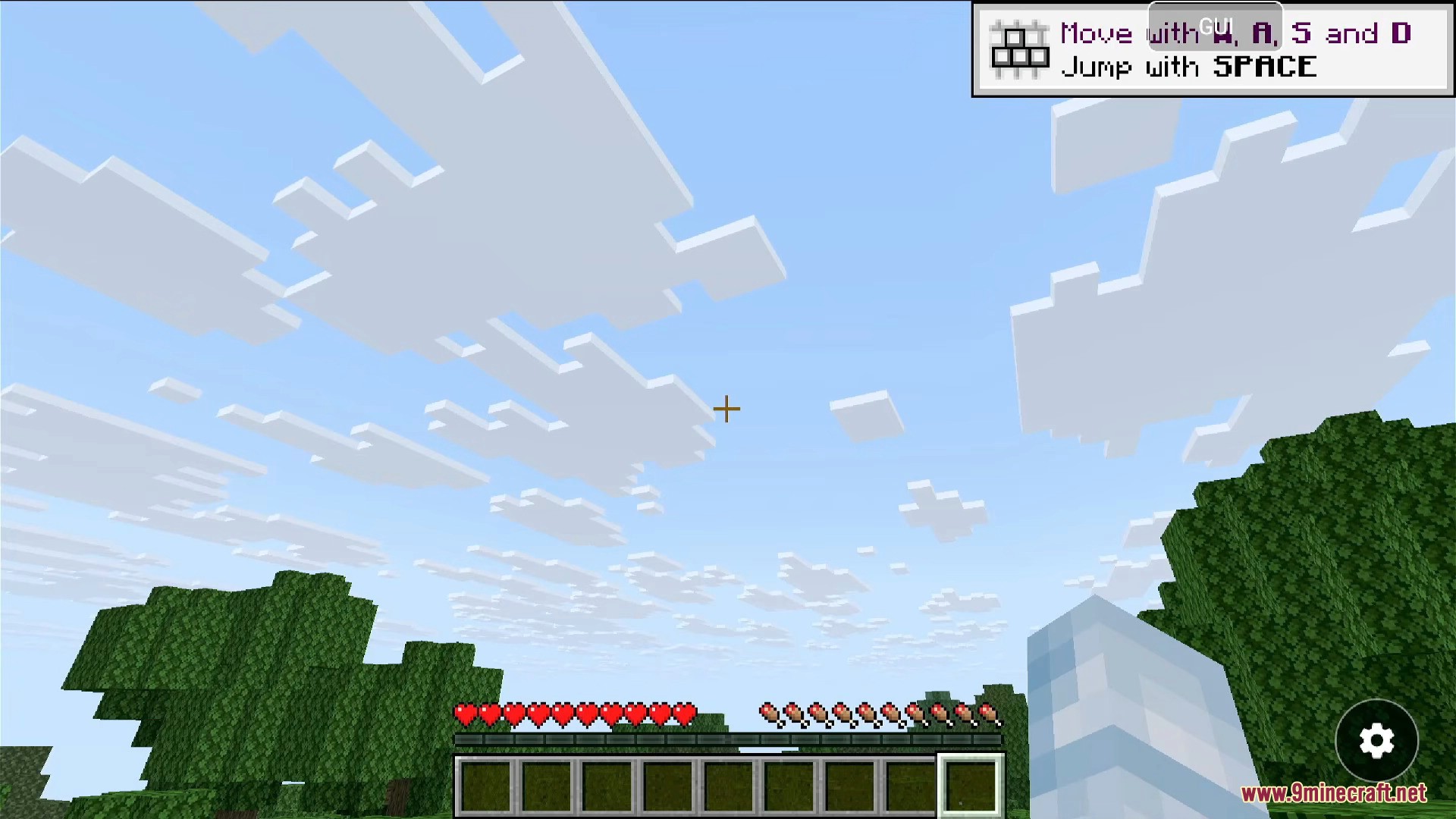 Minecraft Java Edition gameplay with on-screen control hints