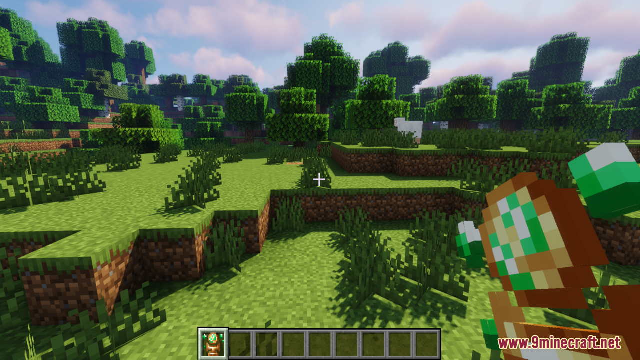 Earth Totem of Undying Resource Pack Screenshot 2 Player holding the custom nature themed totem in a grassy forest biome