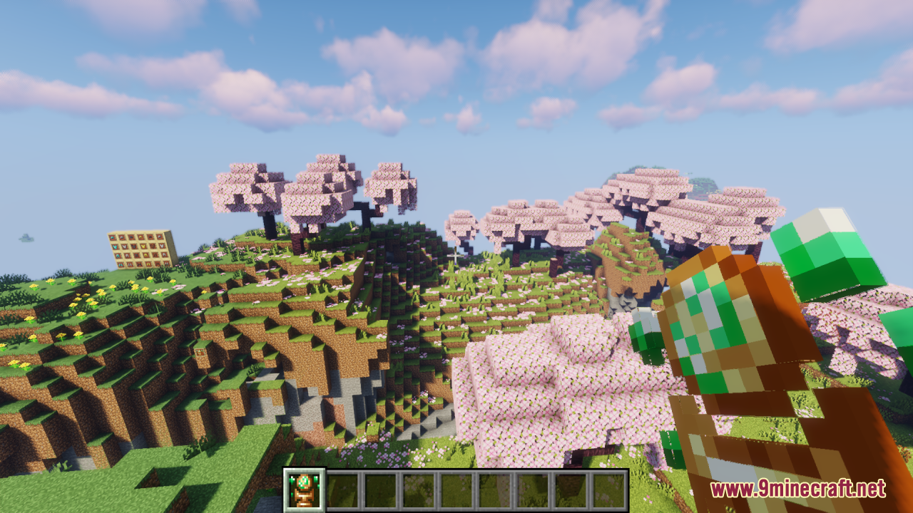 Earth Totem of Undying Resource Pack Screenshot 5 Player holding a custom nature themed totem in a cherry grove biome