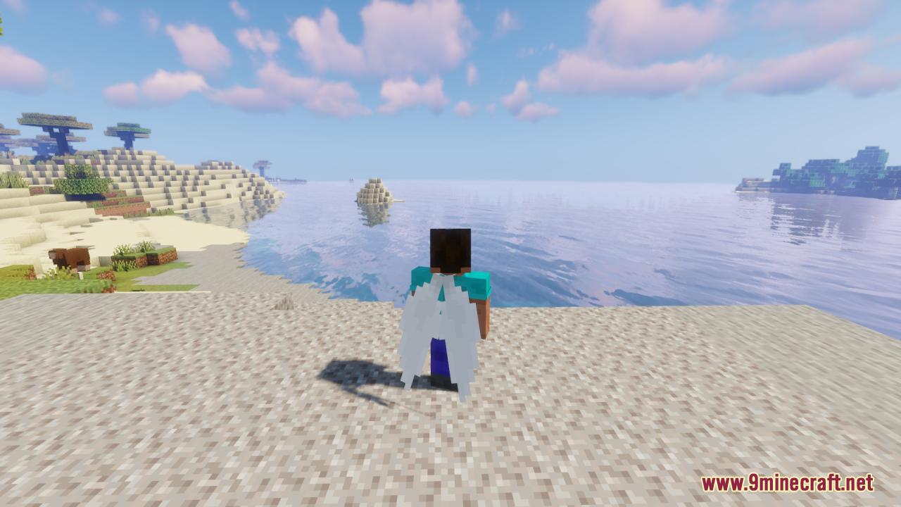 A player character with white fairy wings on a beach