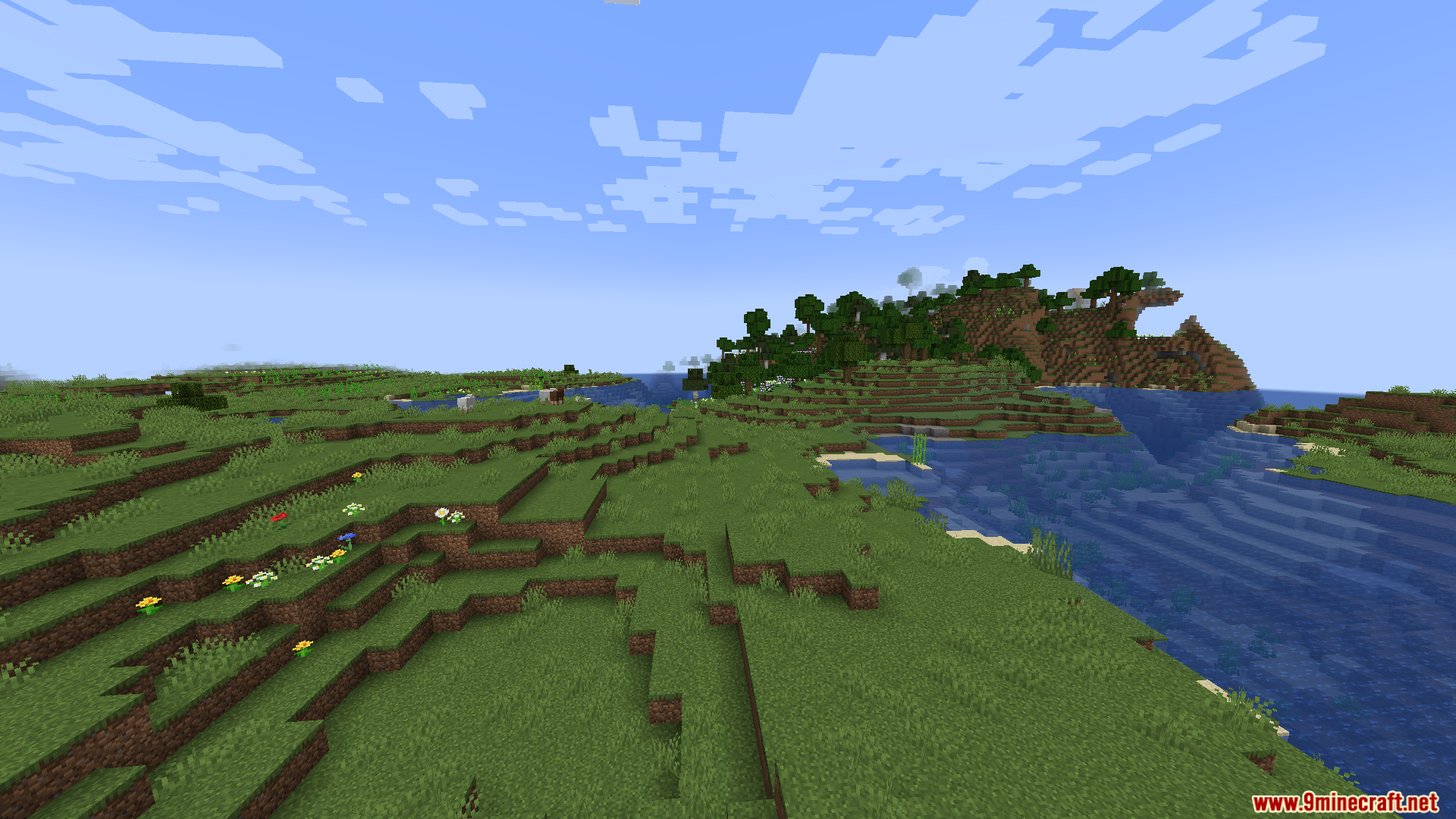 Rolling green hills and islands in a vast landscape