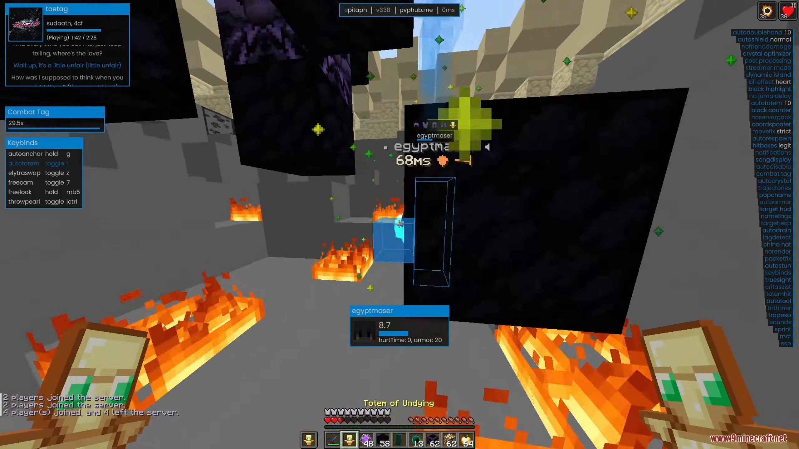 Player holding a Totem of Undying during combat