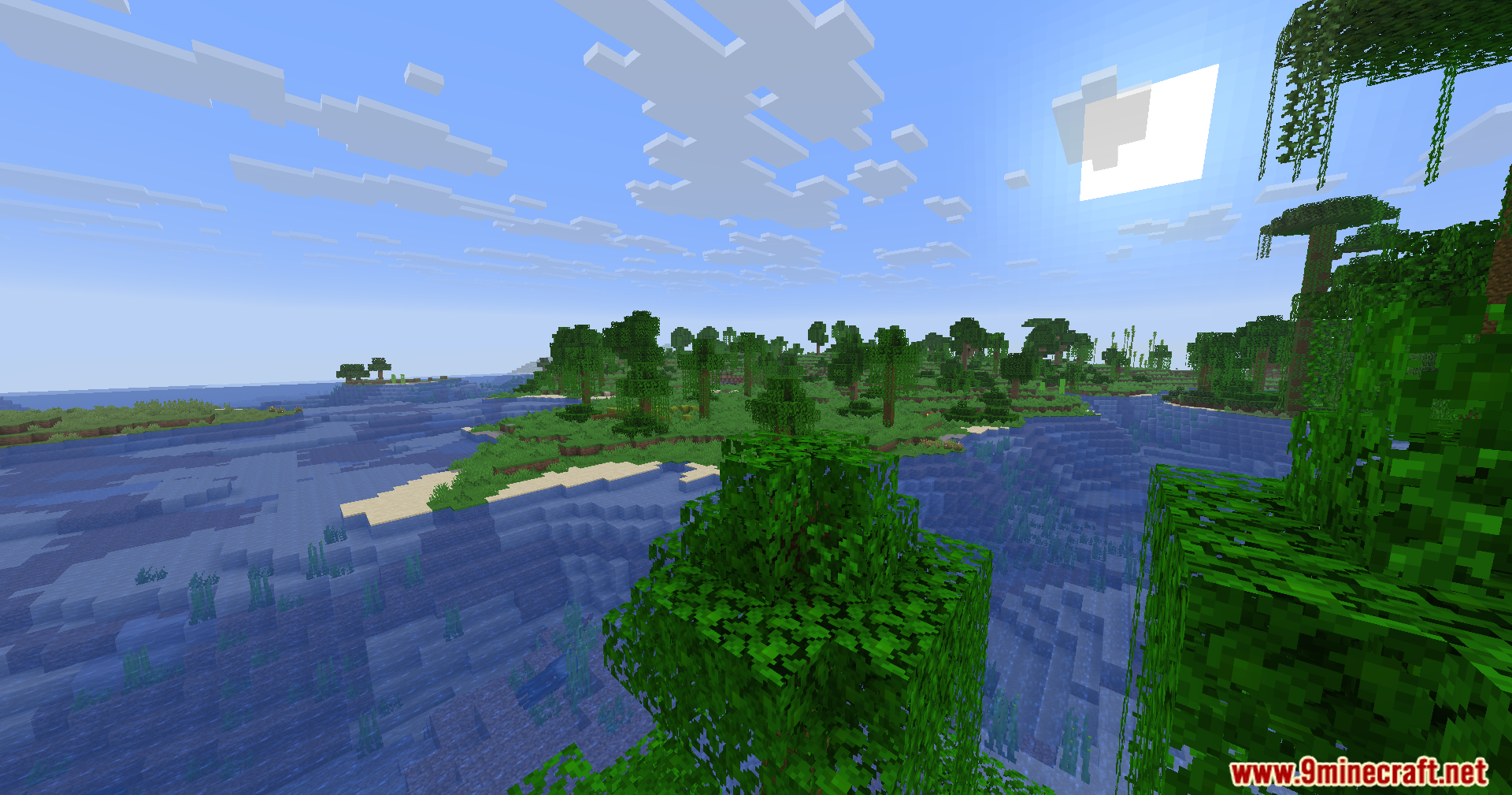 Fake Fabric Loader Mod Screenshot 5 Minecraft jungle landscape with tall trees and vines bordering a deep blue ocean