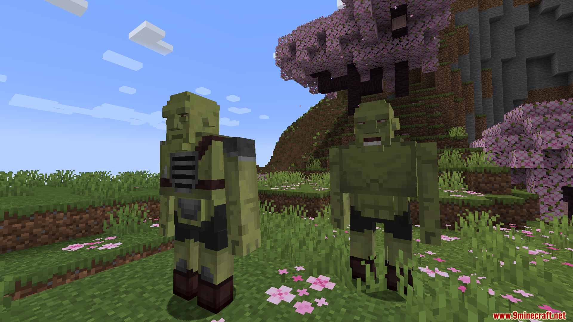 Two Super Mutant mobs standing in a grassy field