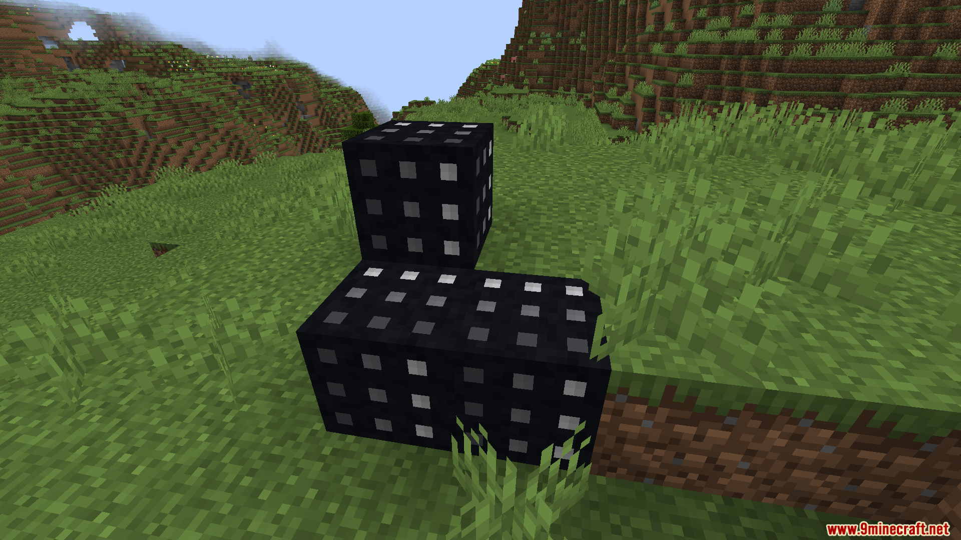 Black decorative blocks with a white grid pattern