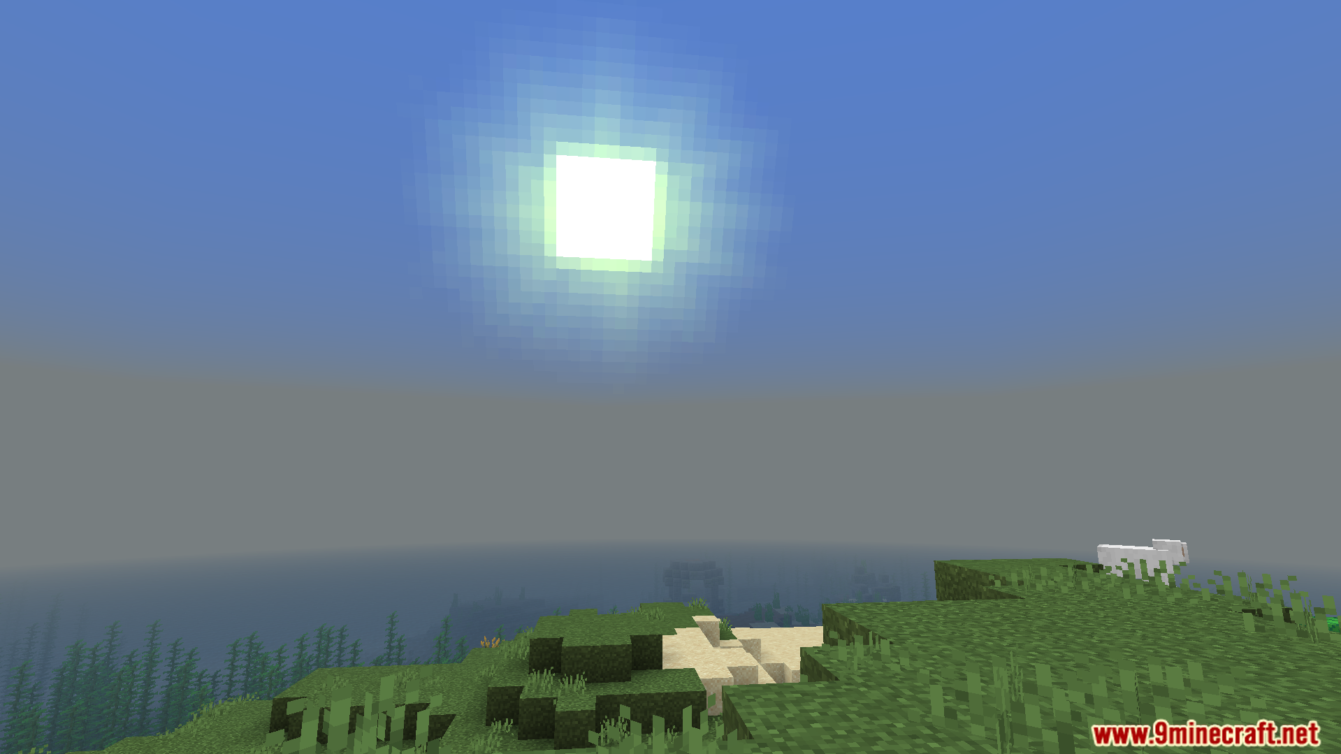 Feather FPS Boost Addon Screenshot 4 bright sun shining over a grassy hill and ocean in minecraft gameplay