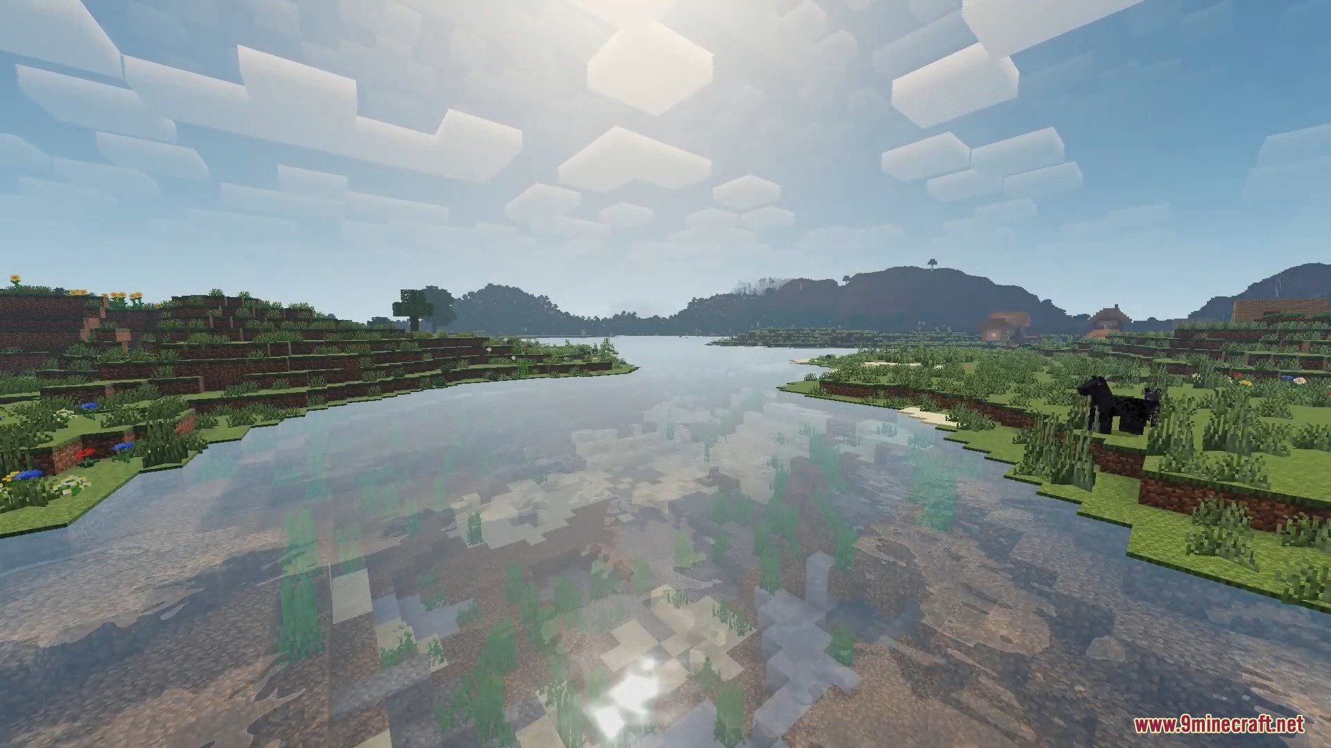 FirmamentCraft 5.0 Shader Screenshot 1 Scenic Minecraft landscape featuring a river with realistic water reflections and clouds