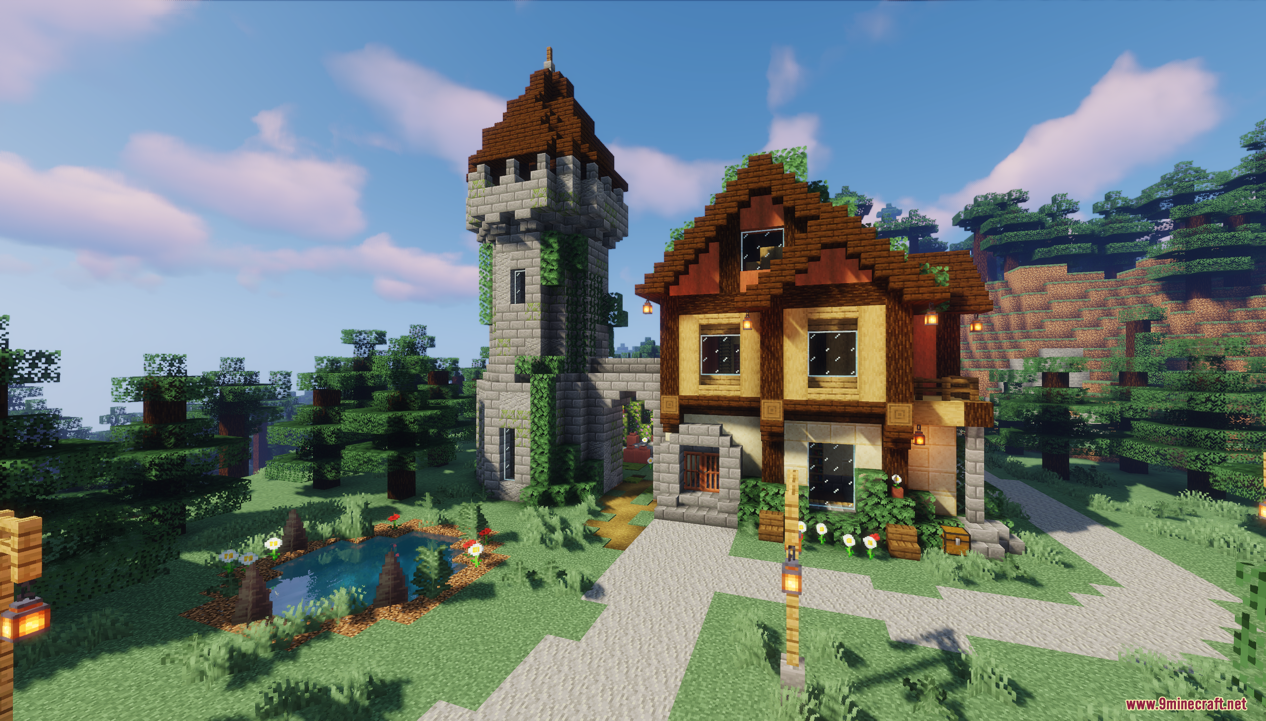 A medieval house with a stone tower next to a pond