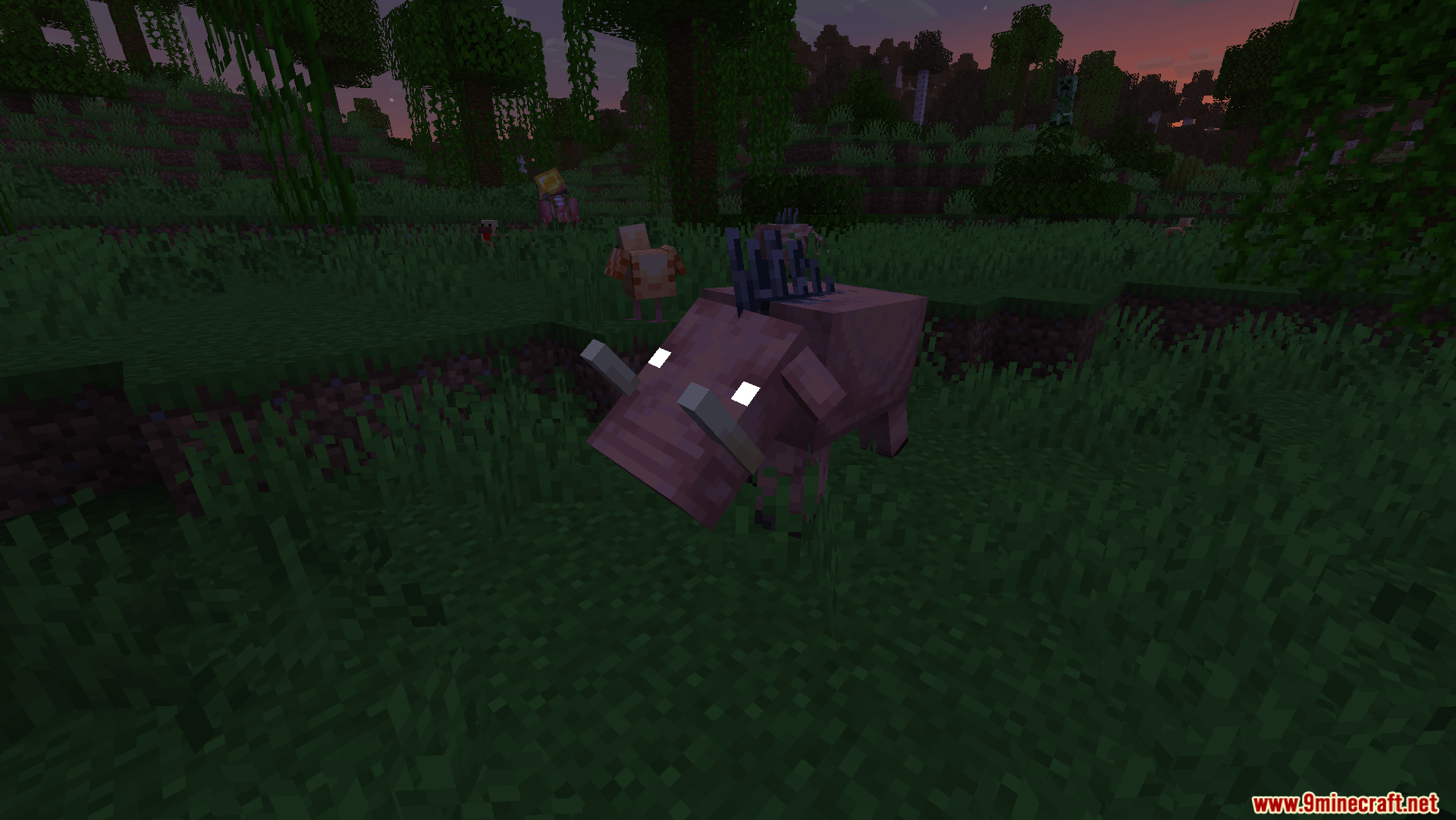 A Hoglin with glowing white eyes stands in a grassy field at night