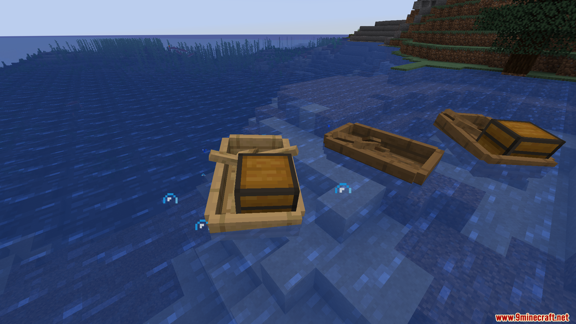 Several wooden boats floating in the water including two with storage chests