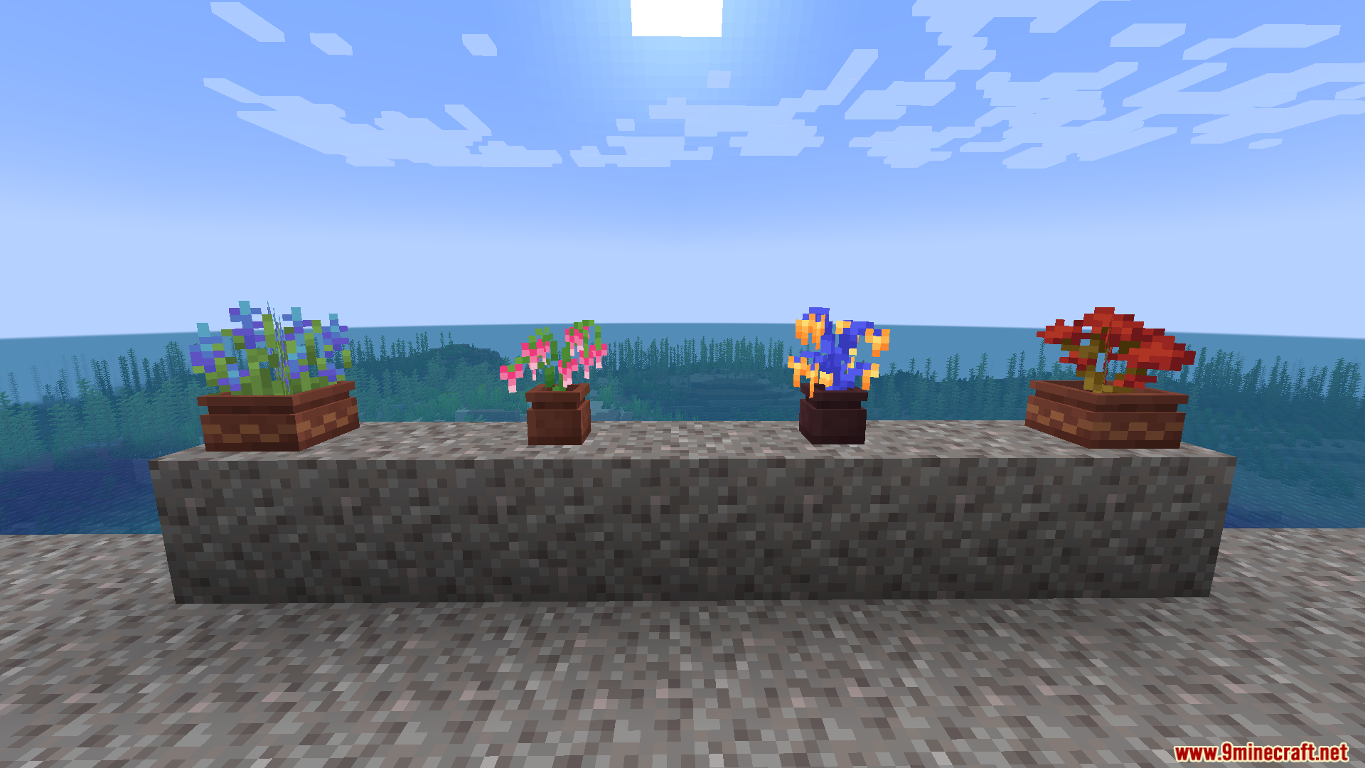 Colorful modded flowers placed in detailed custom pots on a stone wall
