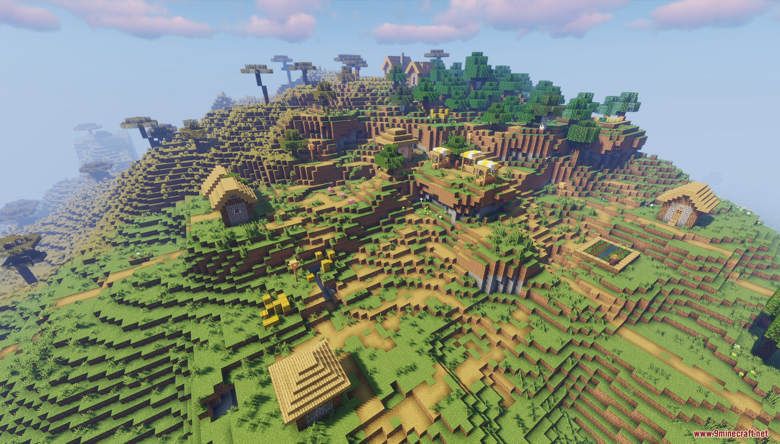 A sprawling savanna village built on a terraced hillside