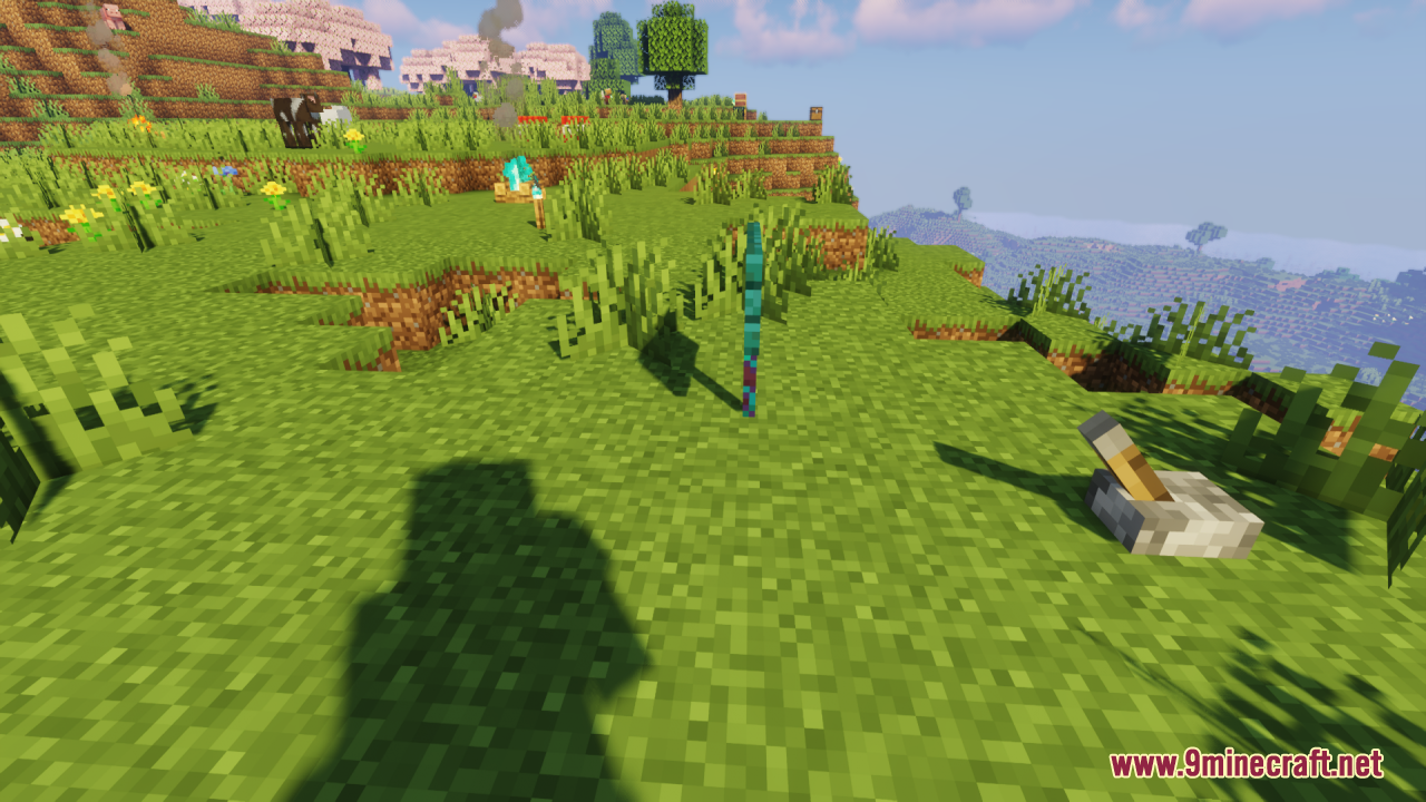 Player view of 3D items on a sunny hillside