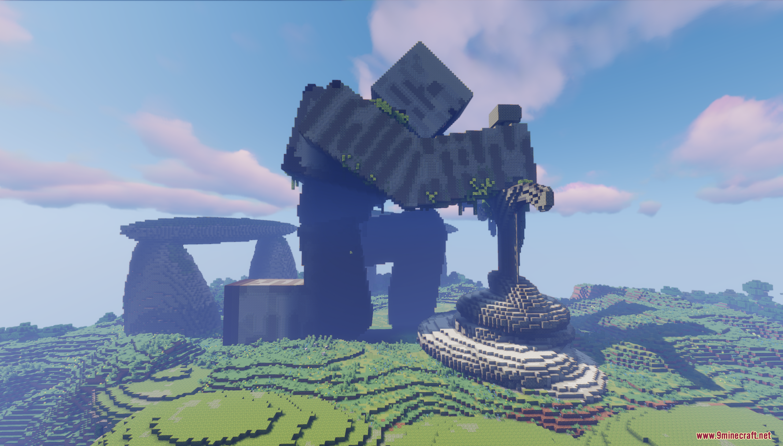 Massive iron golem statue kneeling with a giant sword in a grassy landscape