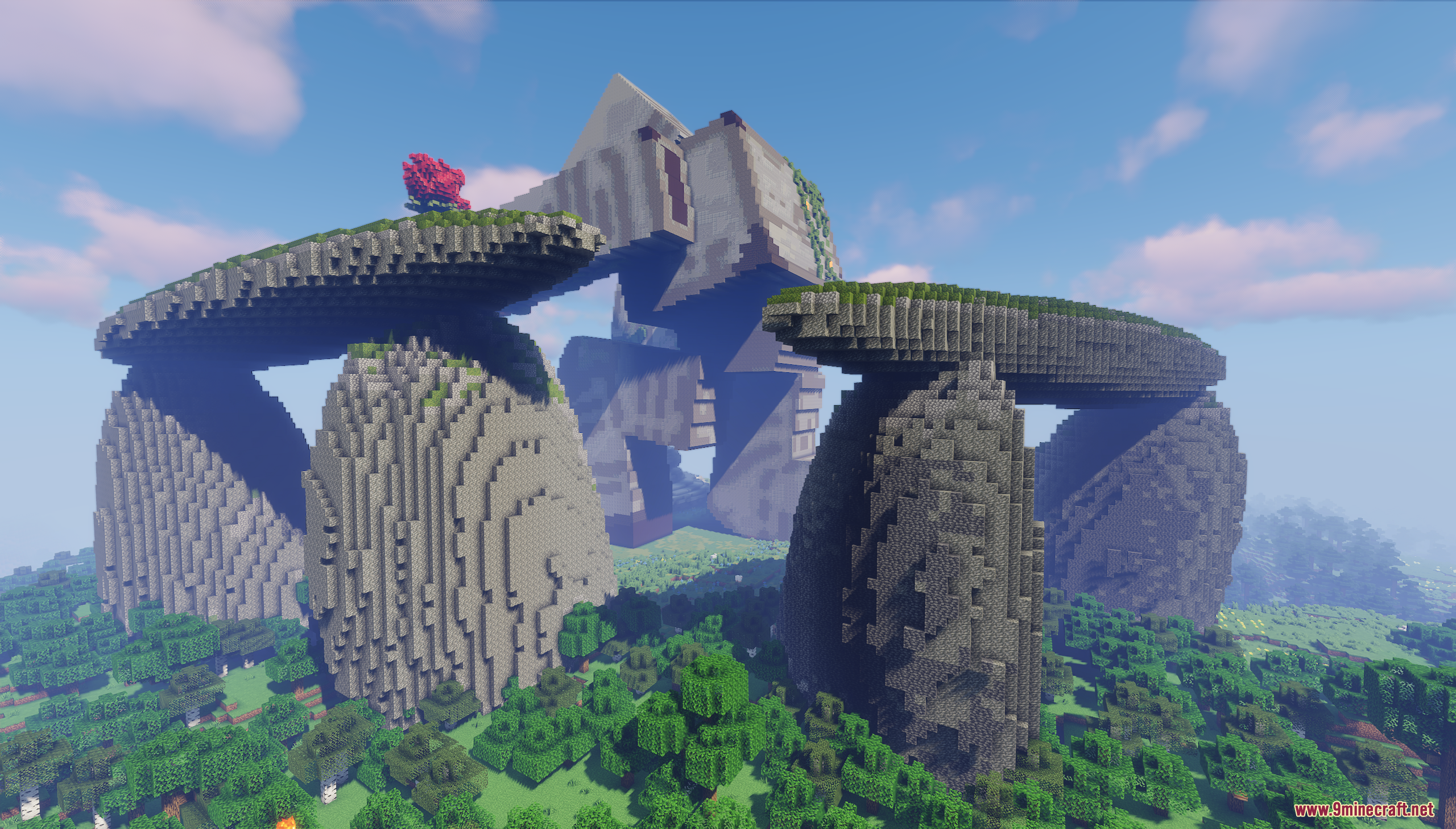 Giant Iron Golem build standing behind huge stone archways in a forest