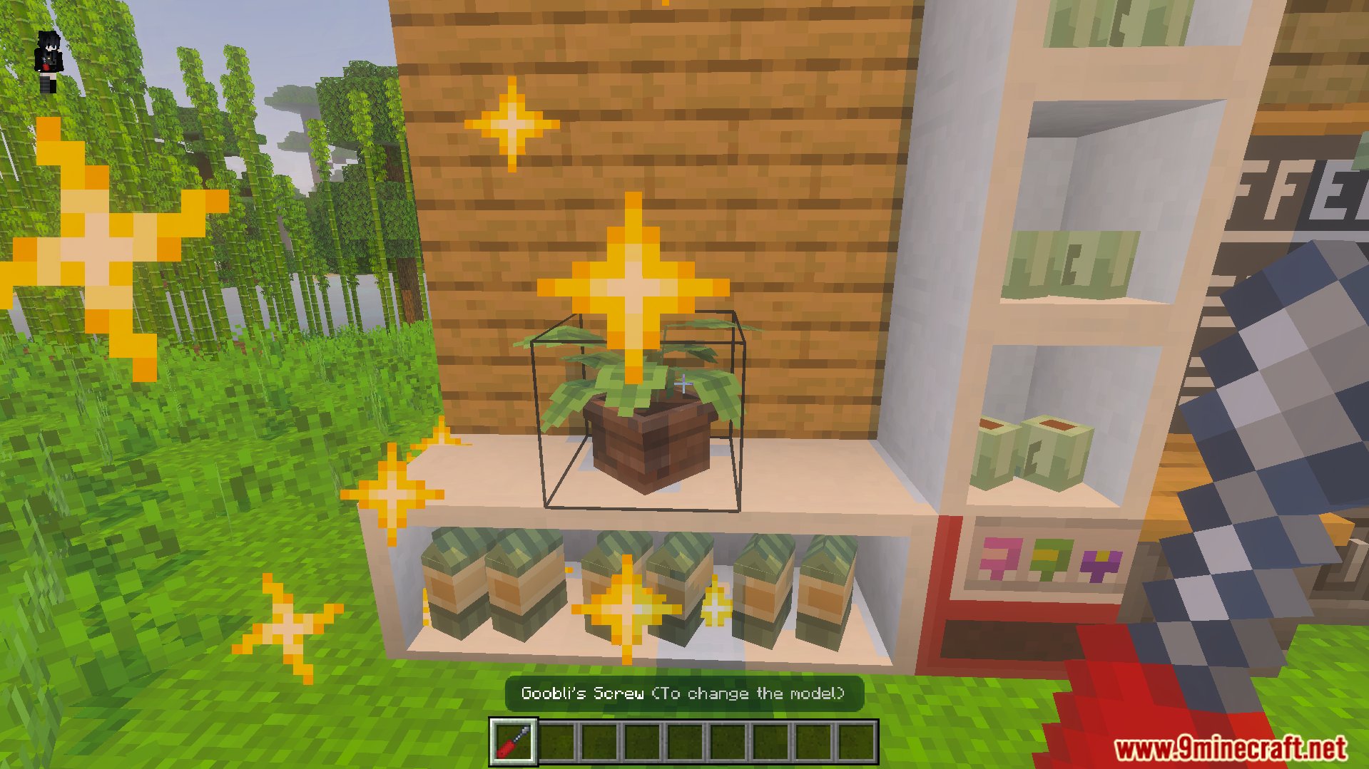 Gooblideco MCPE/Bedrock Mods & Addon Screenshot 6 Player holding a screwdriver tool near a potted plant