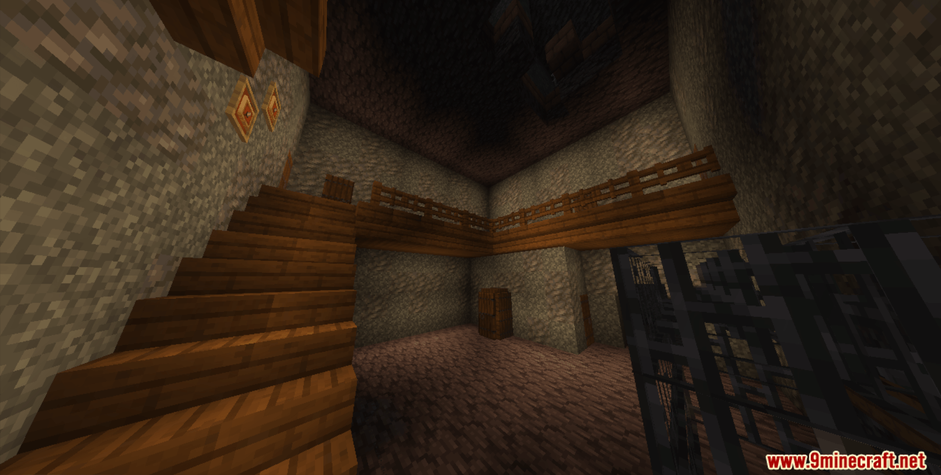 A detailed room inside the scary house with stairs and a cage
