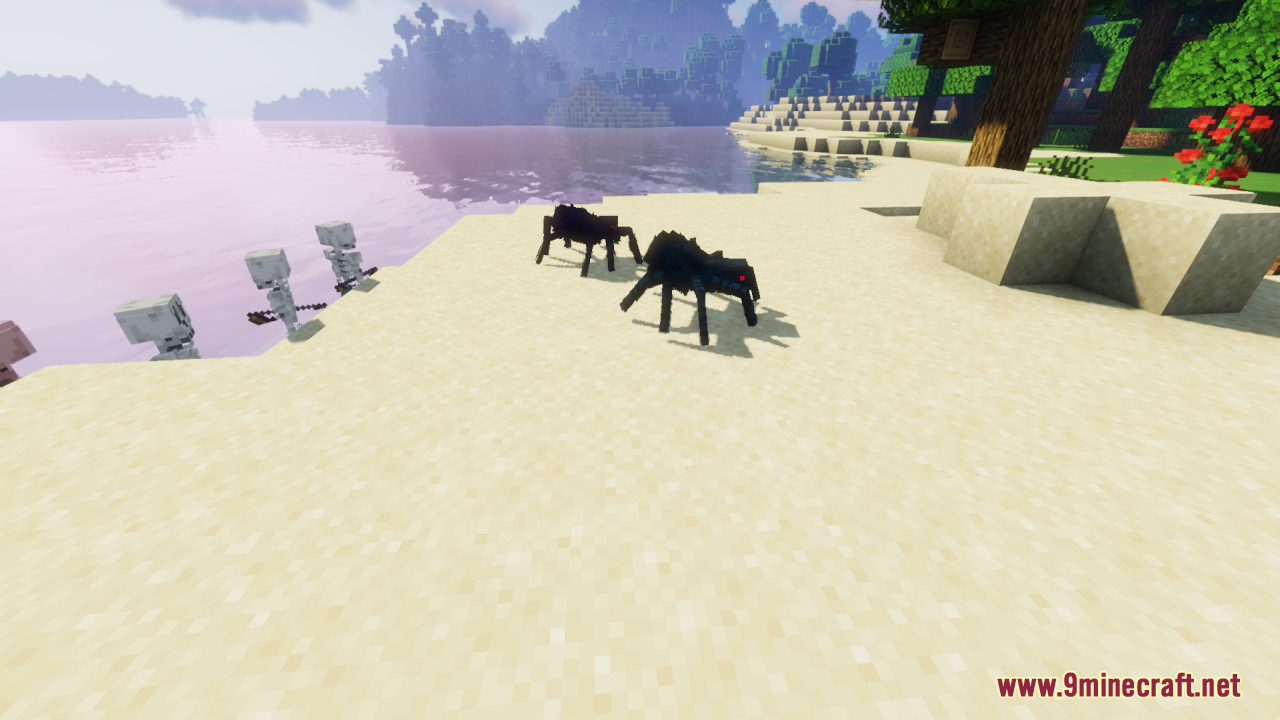 Custom modeled spiders and skeletons standing on a sandy beach near water