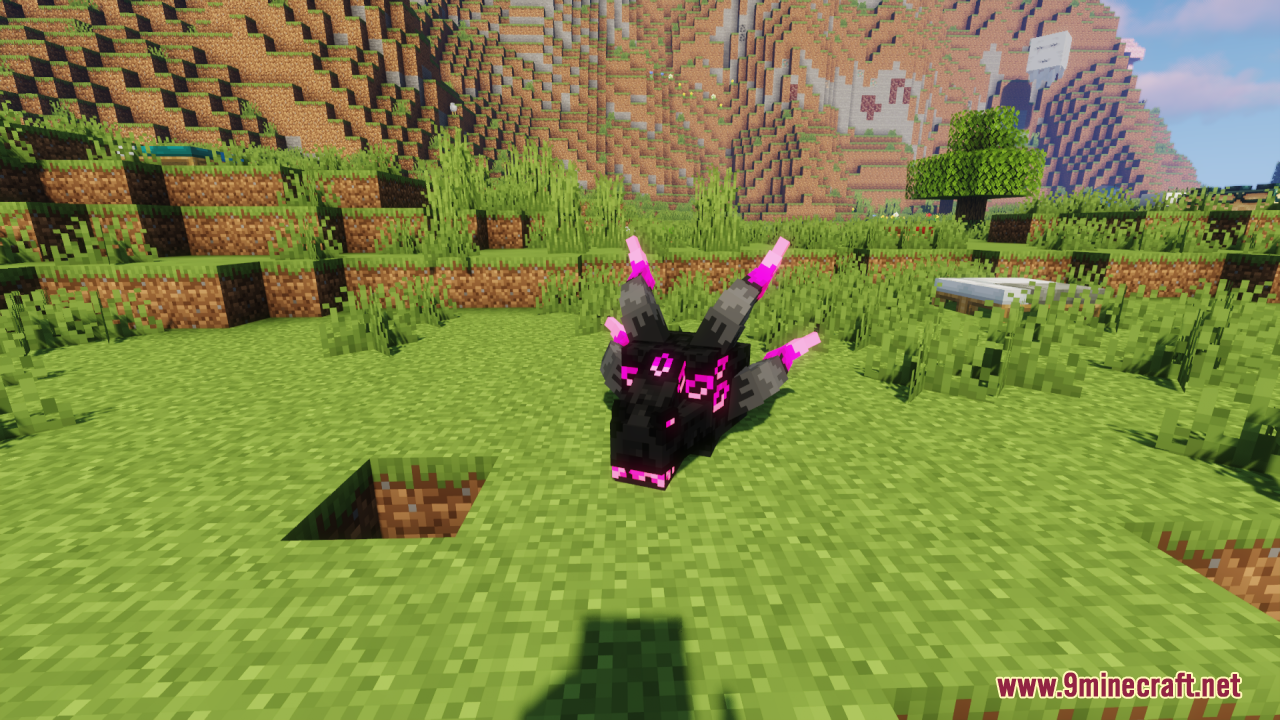 Custom Ender Dragon head model with glowing purple accents on grass