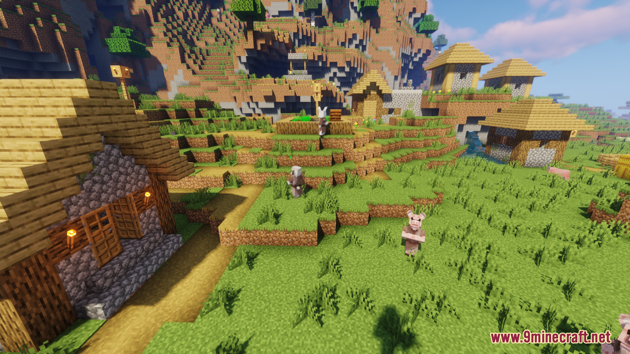 Several custom villagers with new models standing around a grassy village settlement