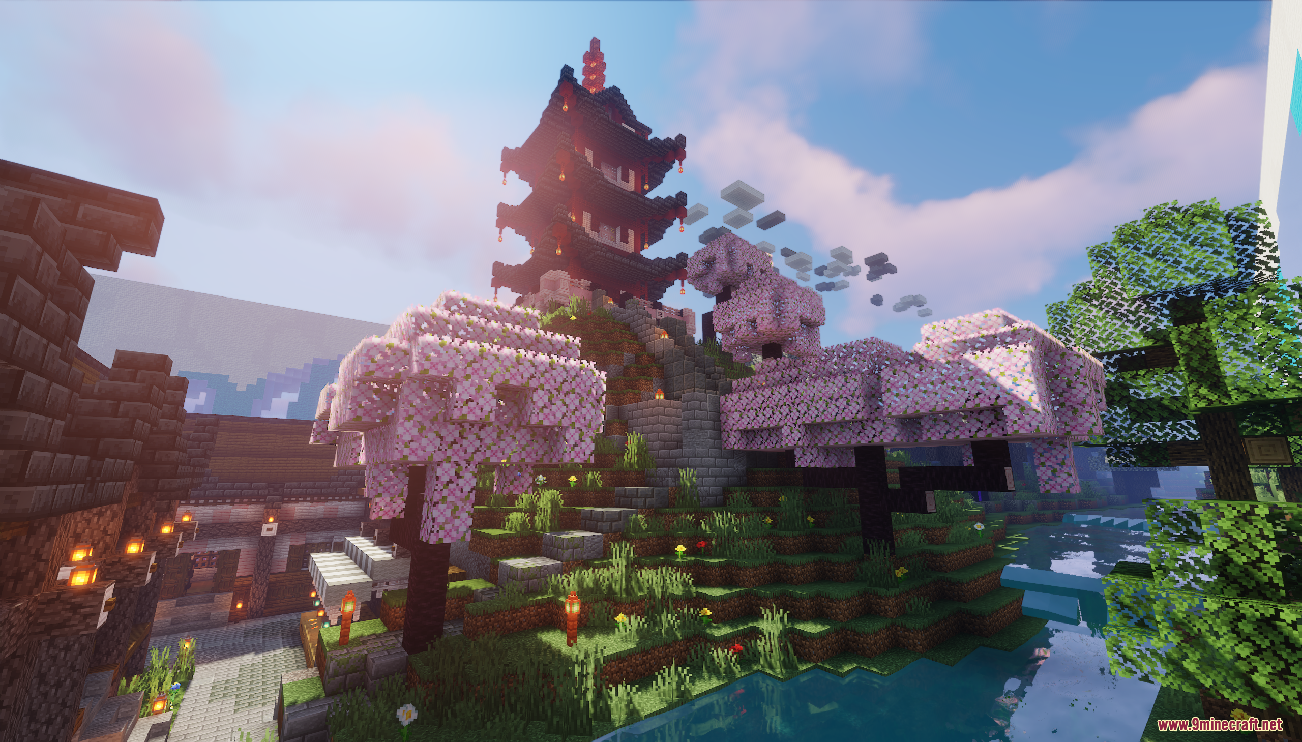 A Japanese pagoda on a hill with cherry blossom trees