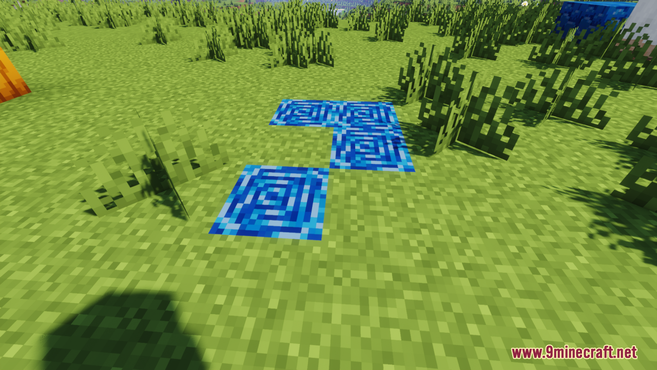 Blue Ancient Debris blocks scattered across a grassy field