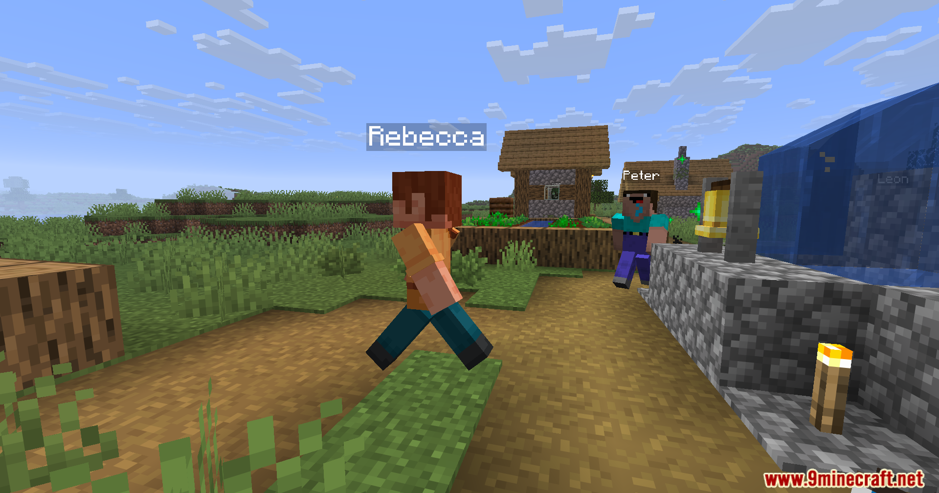 Humanoid Villagers Mod Screenshot 2 Humanoid villagers named Rebecca and Peter walking around a village area