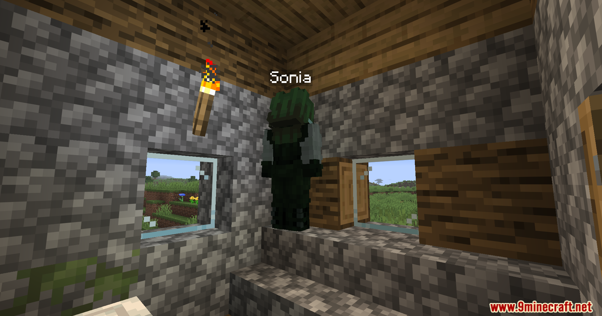 Humanoid Villagers Mod Screenshot 5 A humanoid villager named Sonia stands inside a small cobblestone building