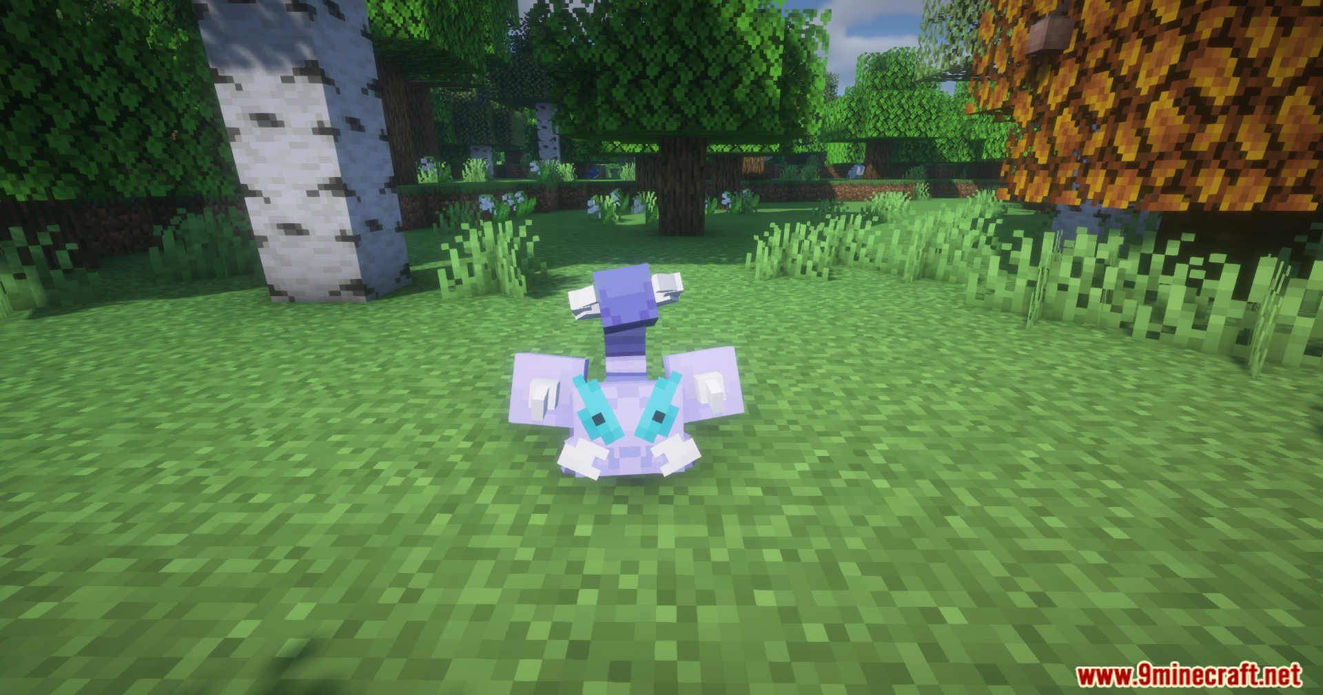 A small Meditite Pokémon sits in a birch forest