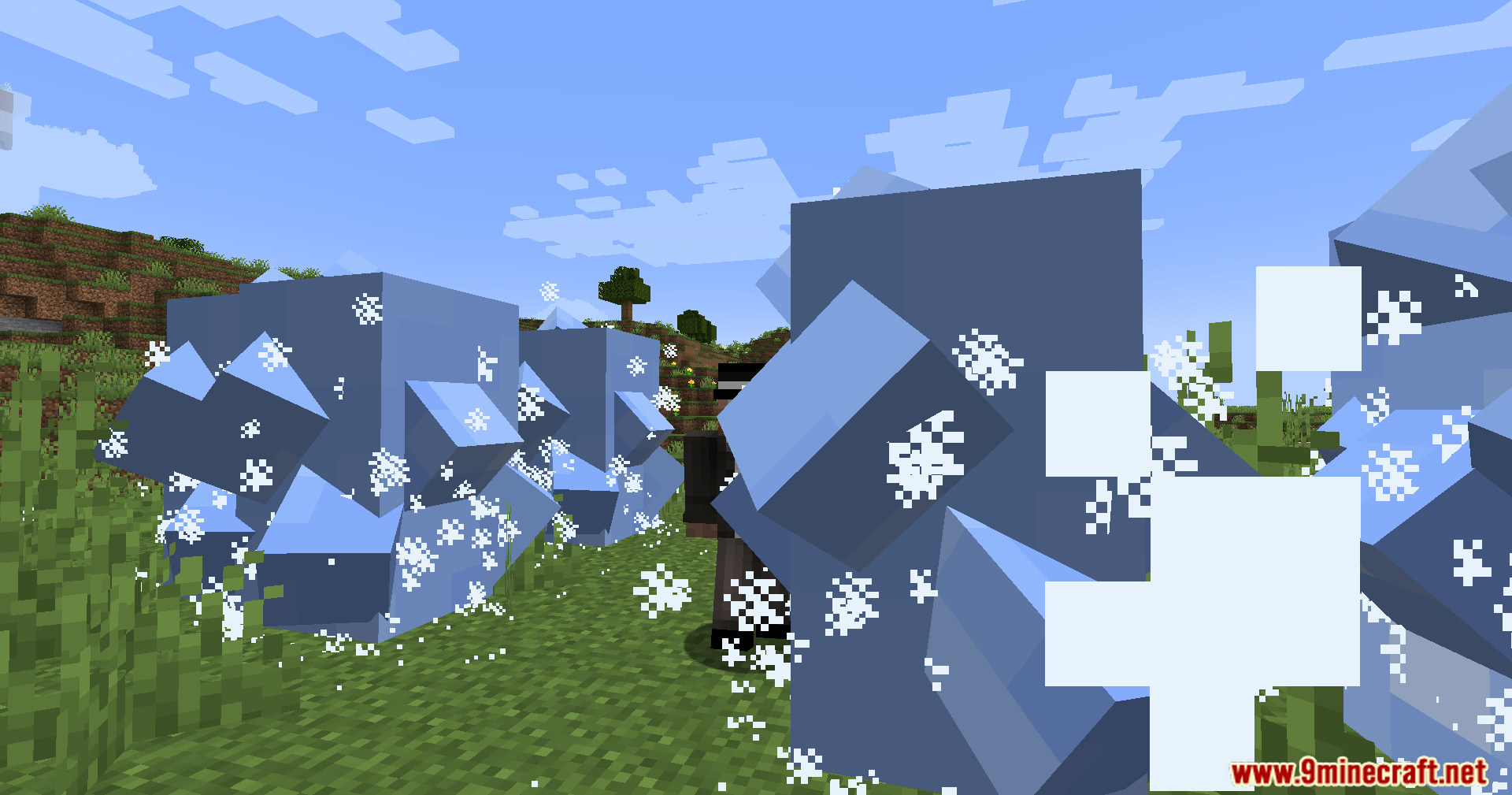 Ice Formation Cursed Fate Addon Mod Screenshot 9 Player surrounded by large jagged ice formations and frost particles in a grassy field