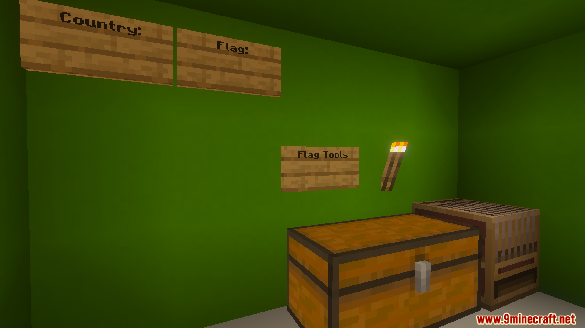 A chest and loom next to signs in a green room