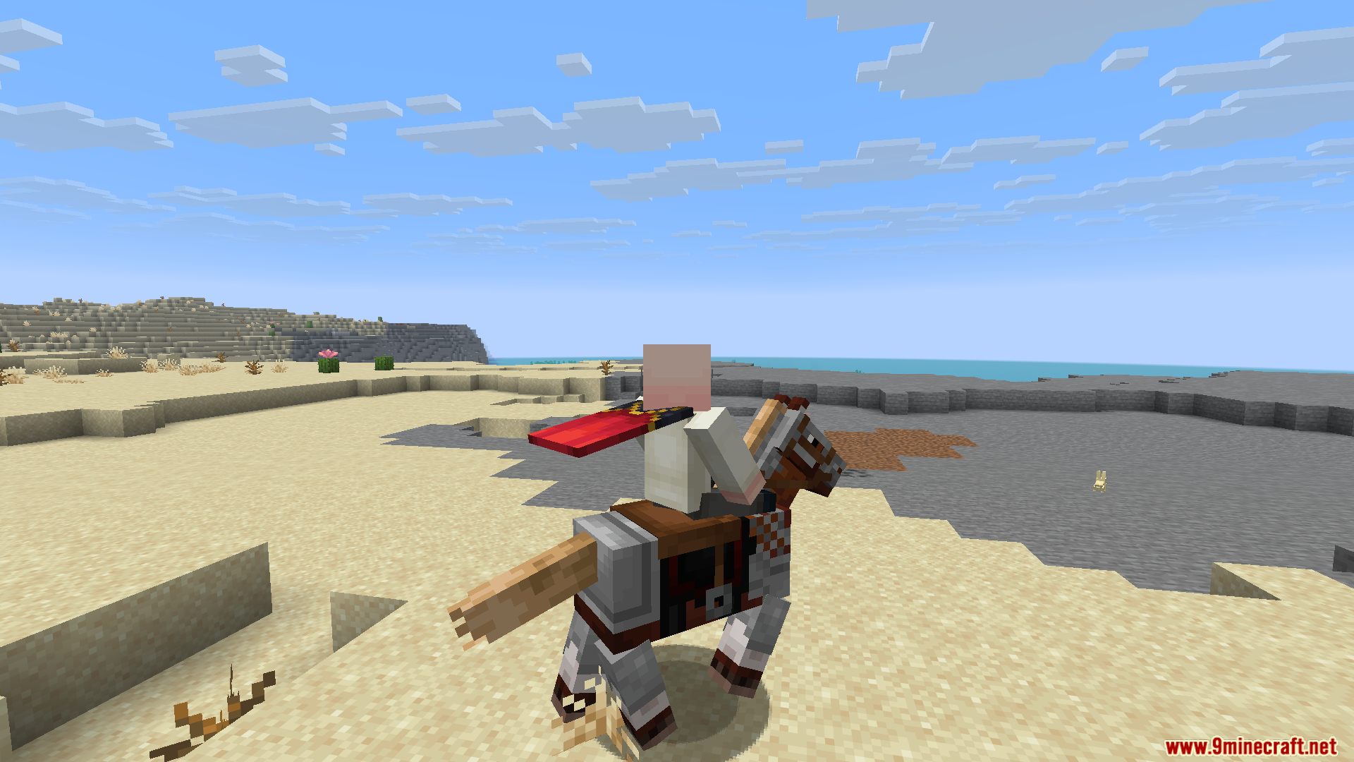 Player riding an armored horse along a sandy beach