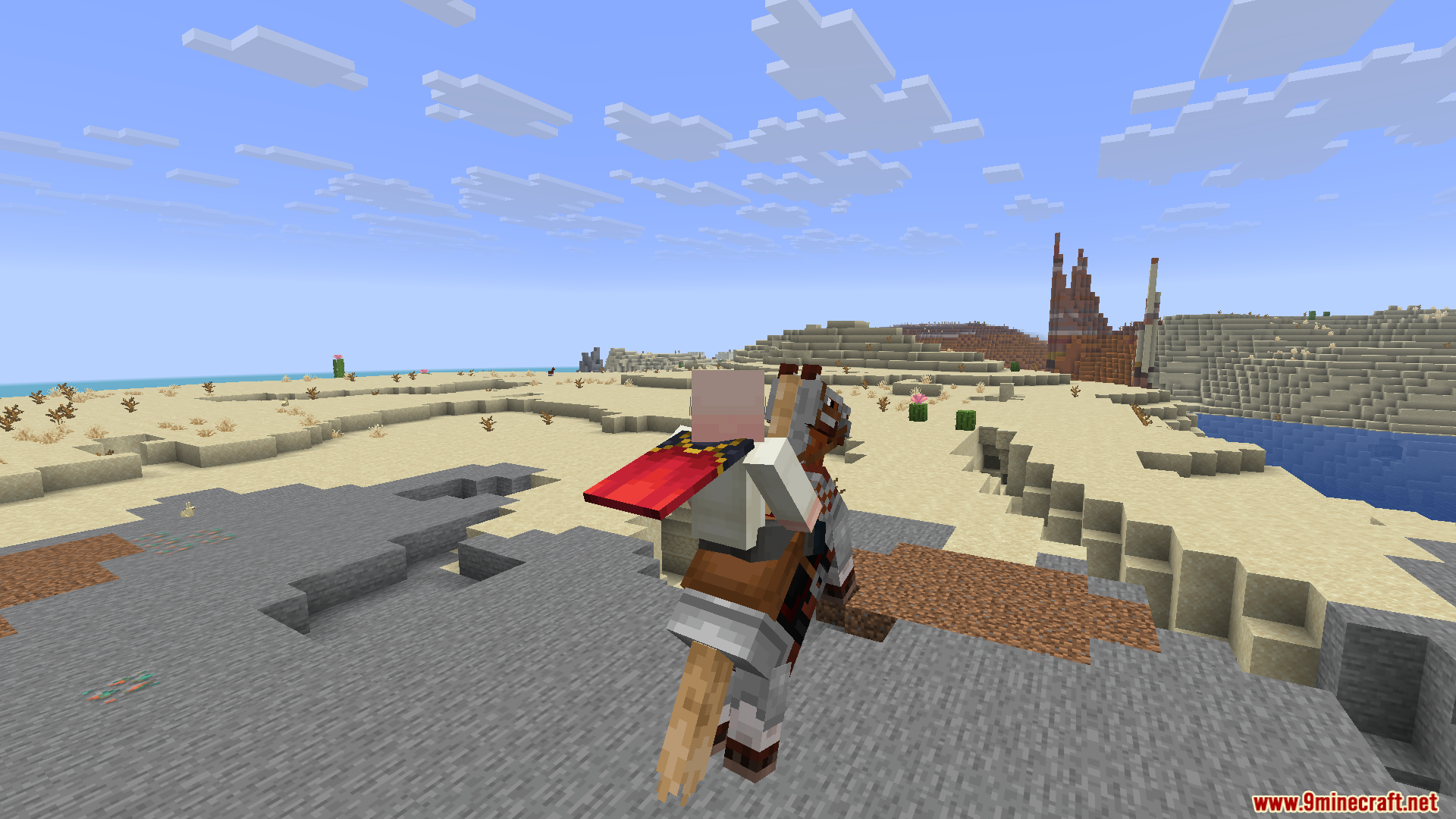 Player on horseback exploring a coastline near a desert biome