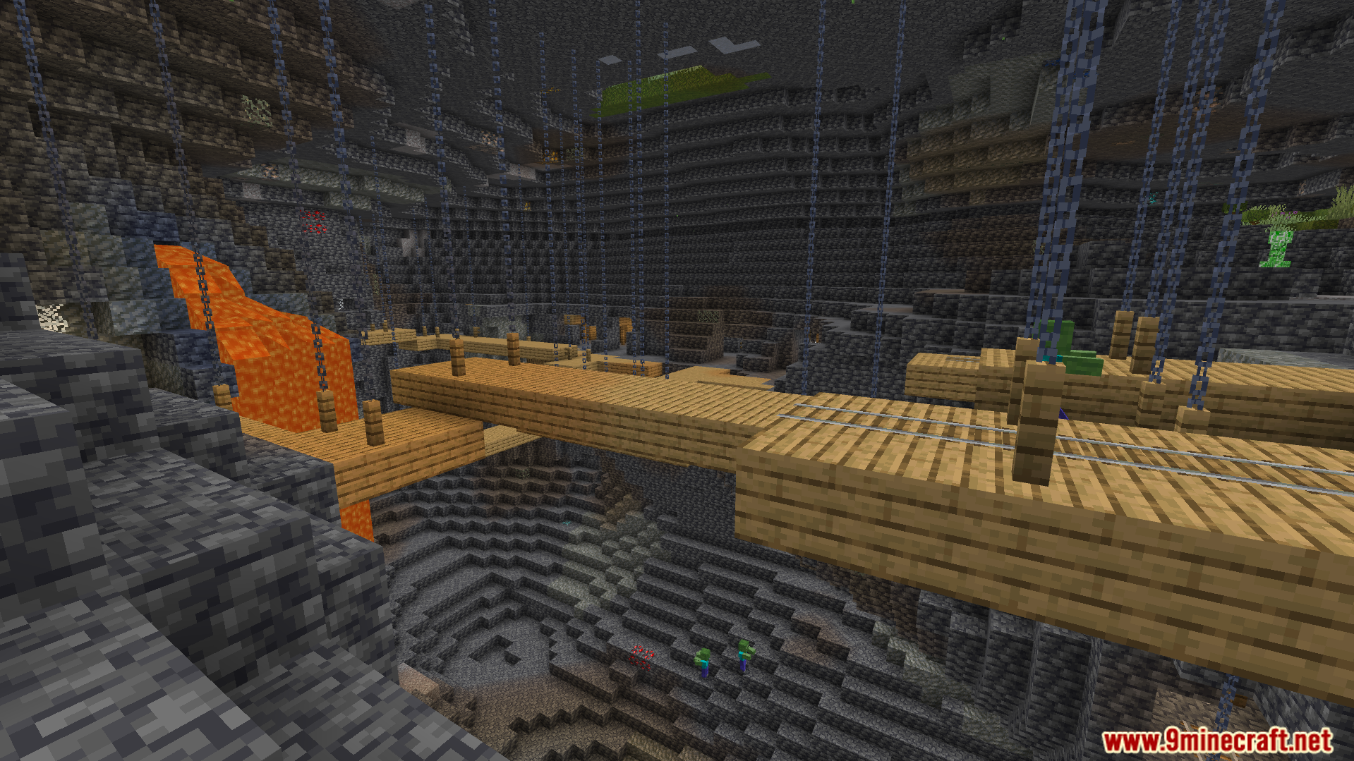 Instant Fullbright Night Vision Addon Screenshot 6 fully illuminated underground ravine with hanging wooden mineshaft bridges and lava falls