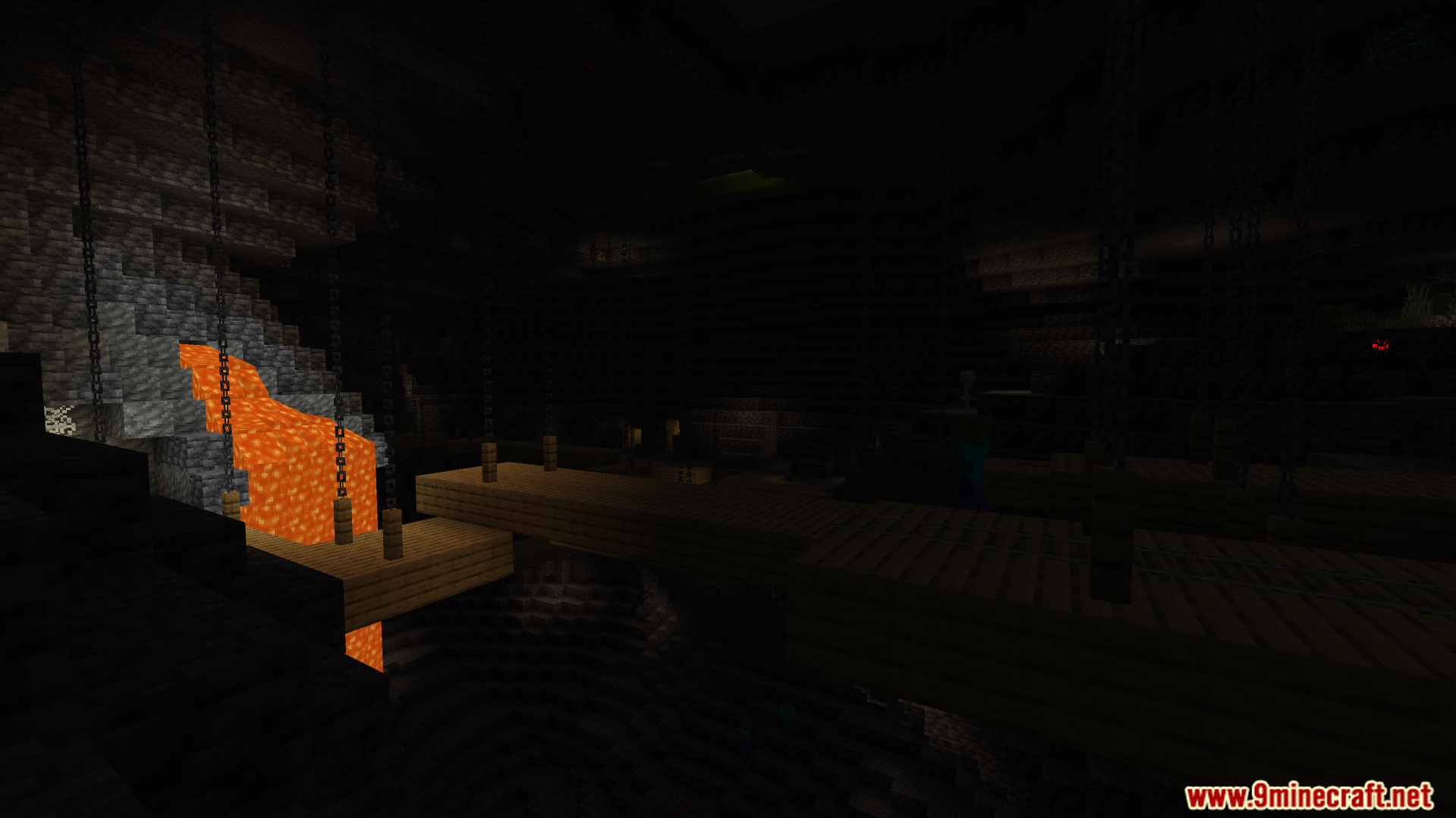 Instant Fullbright Night Vision Addon Screenshot 7 Dark underground cave featuring a lava fall and wooden bridge over water