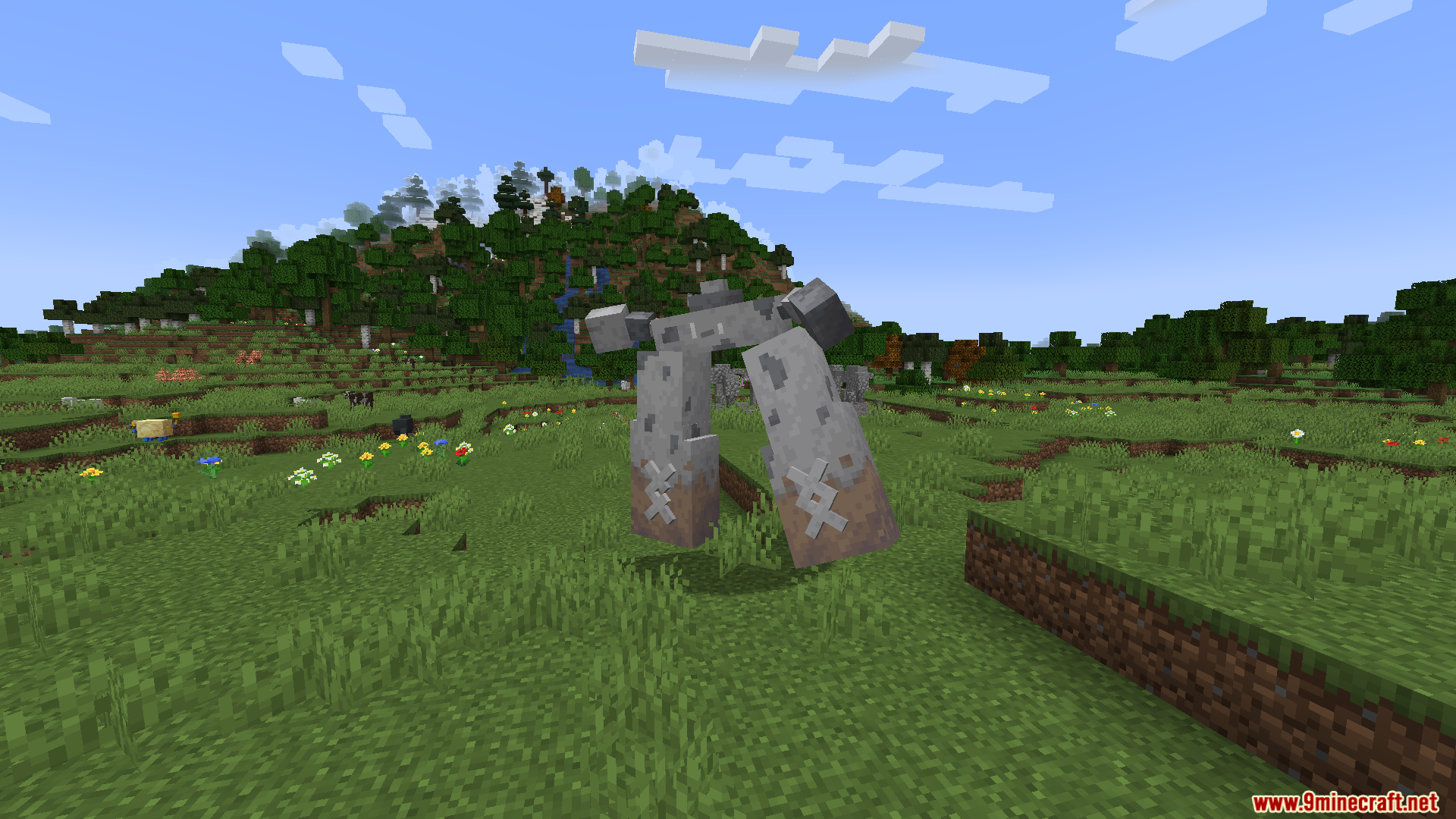 A large stone golem mob walking in a field