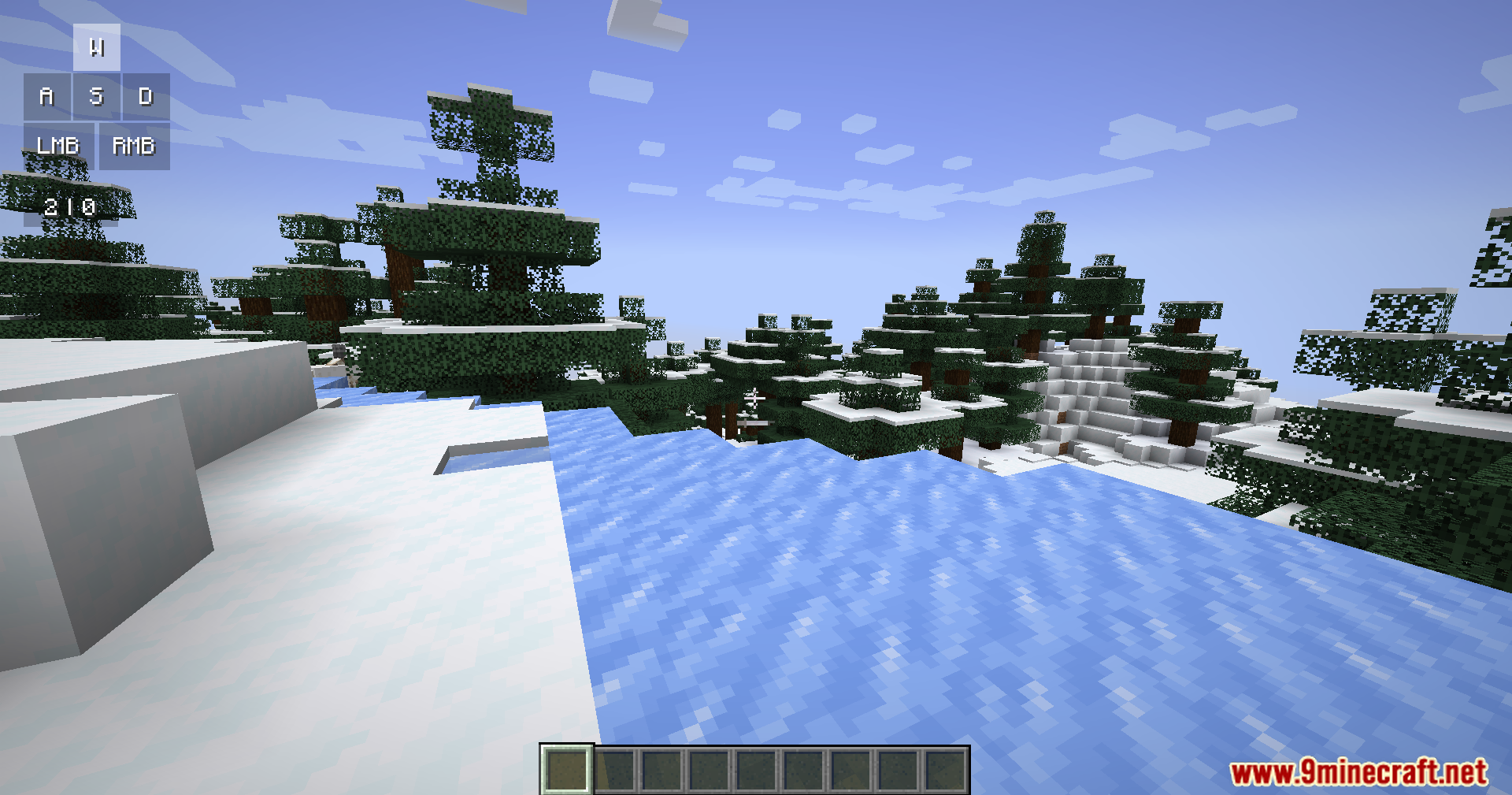 A frozen river in a snowy forest biome with a keystrokes overlay
