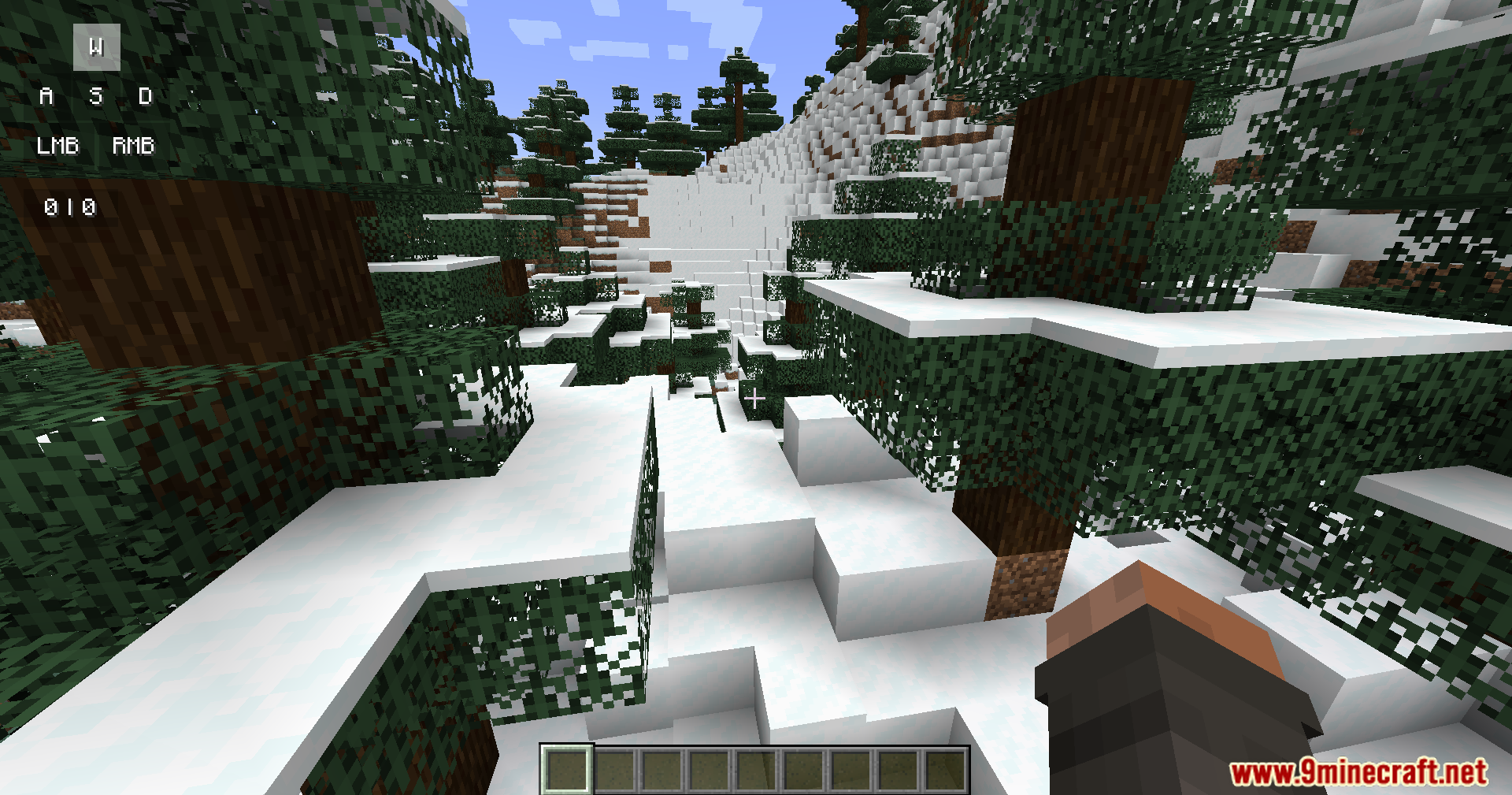 A snowy Minecraft landscape with a keystrokes overlay in the top left corner