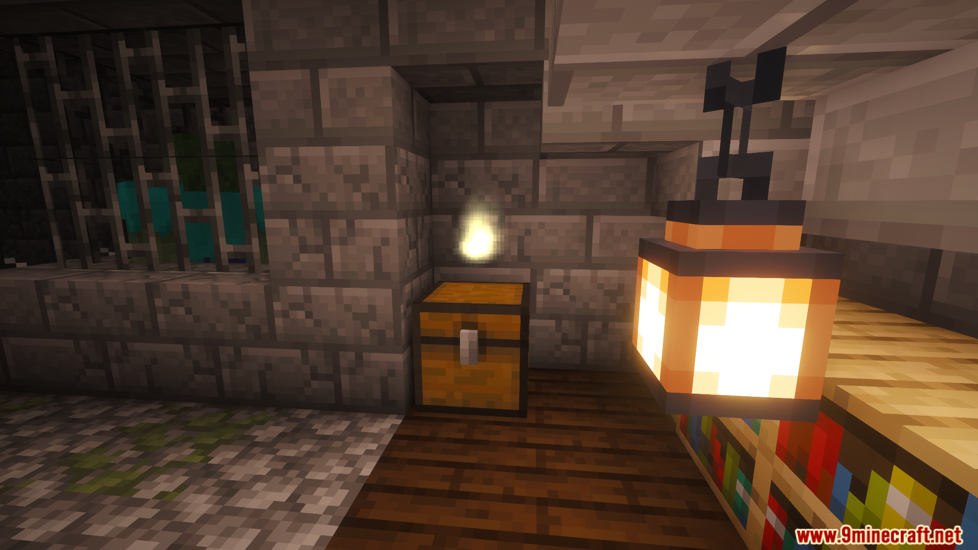 A glowing lantern illuminates a chest in a stone room