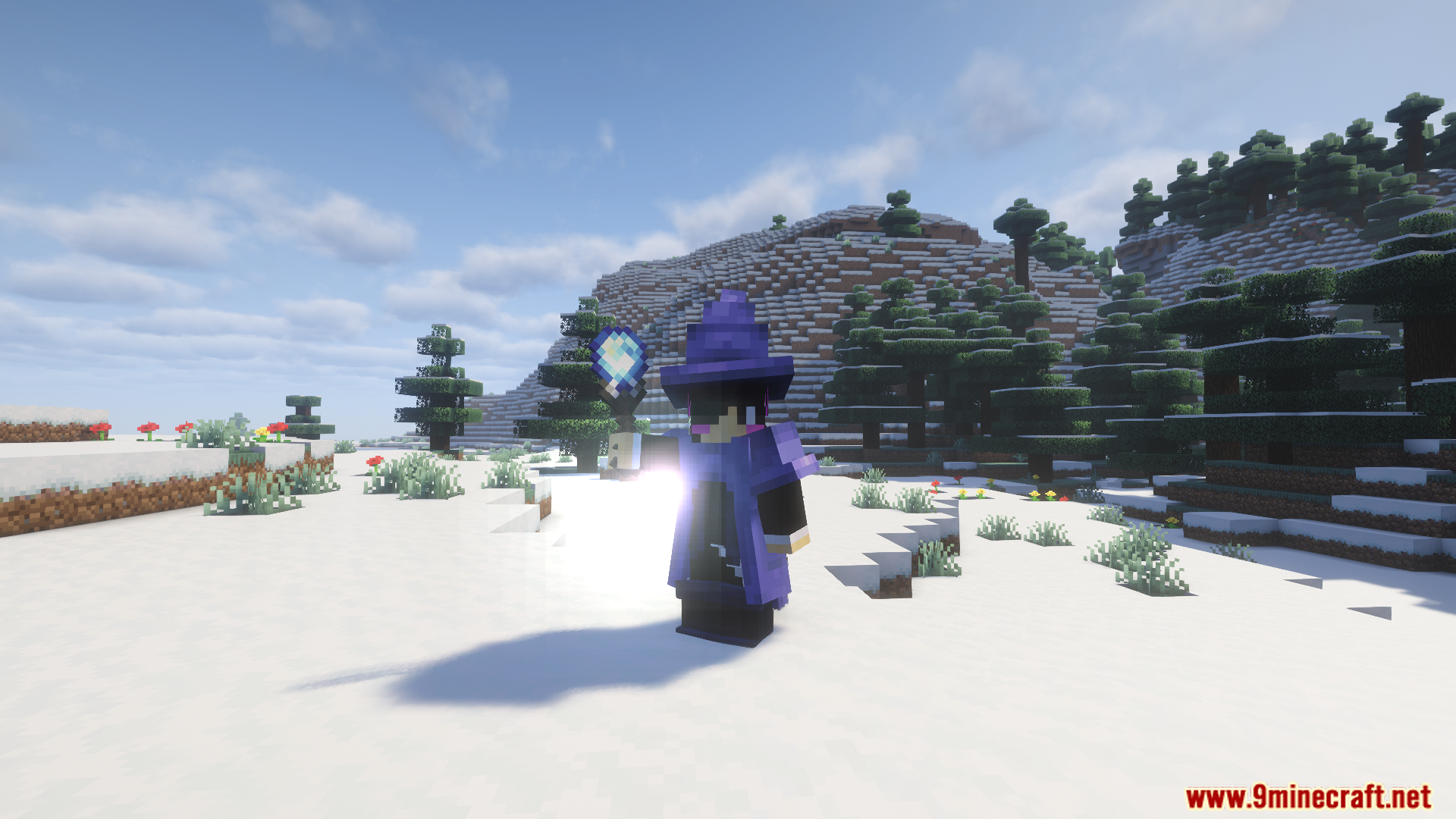 A player dressed as a wizard holding a magic item
