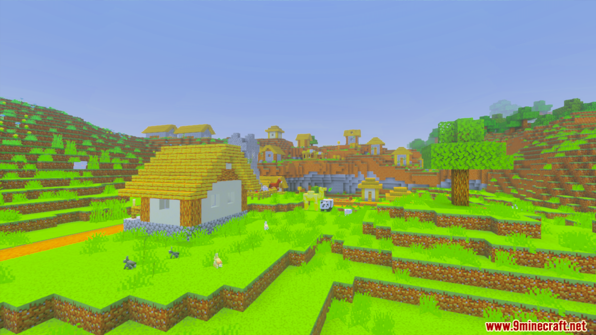 Luna Vibrant Visual Shader Screenshot 3 Village with bright green grass and houses under clear sky