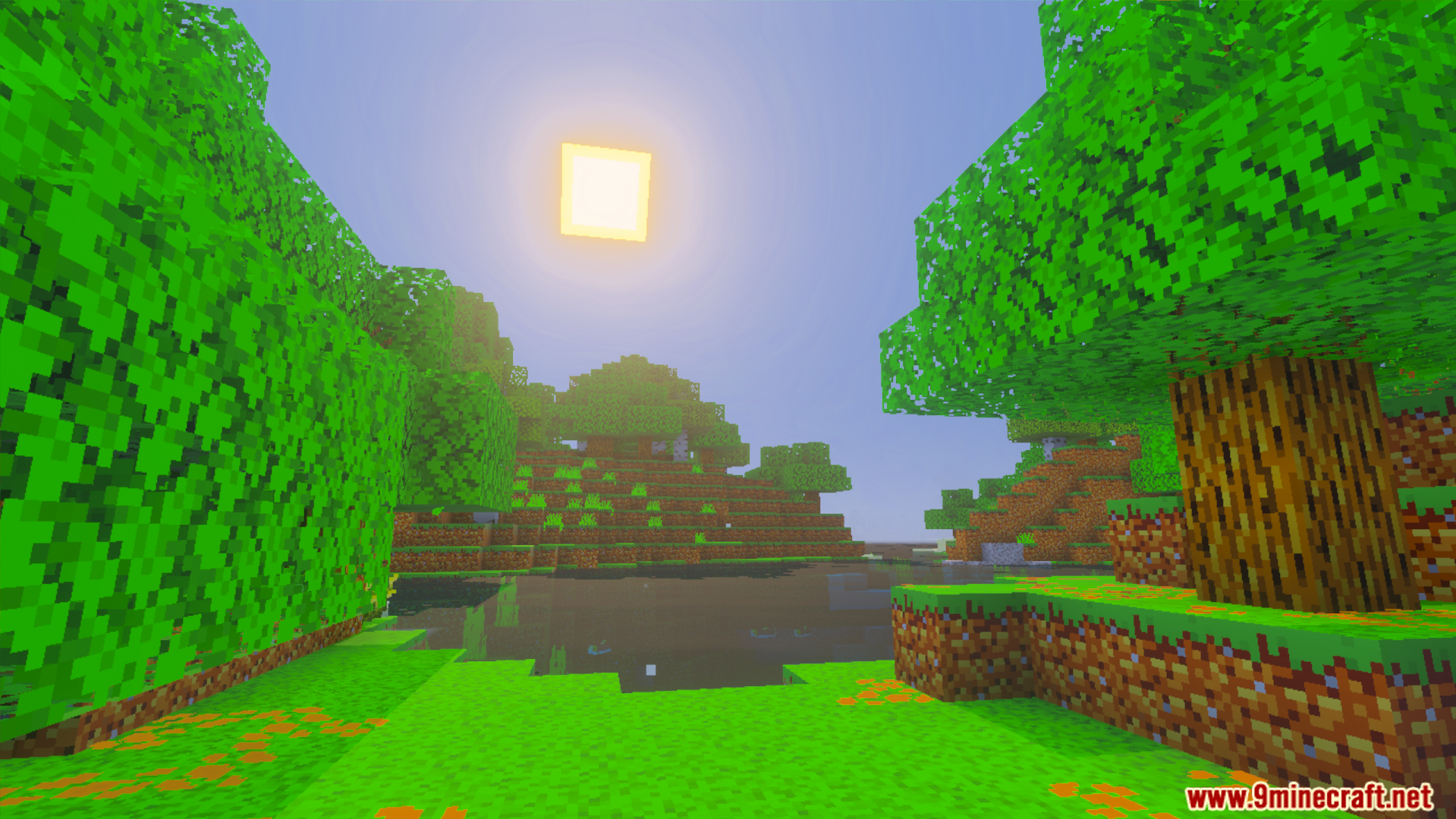 Luna Vibrant Visual Shader Screenshot 5 Bright sunny day over a lake with vibrant green grass and trees