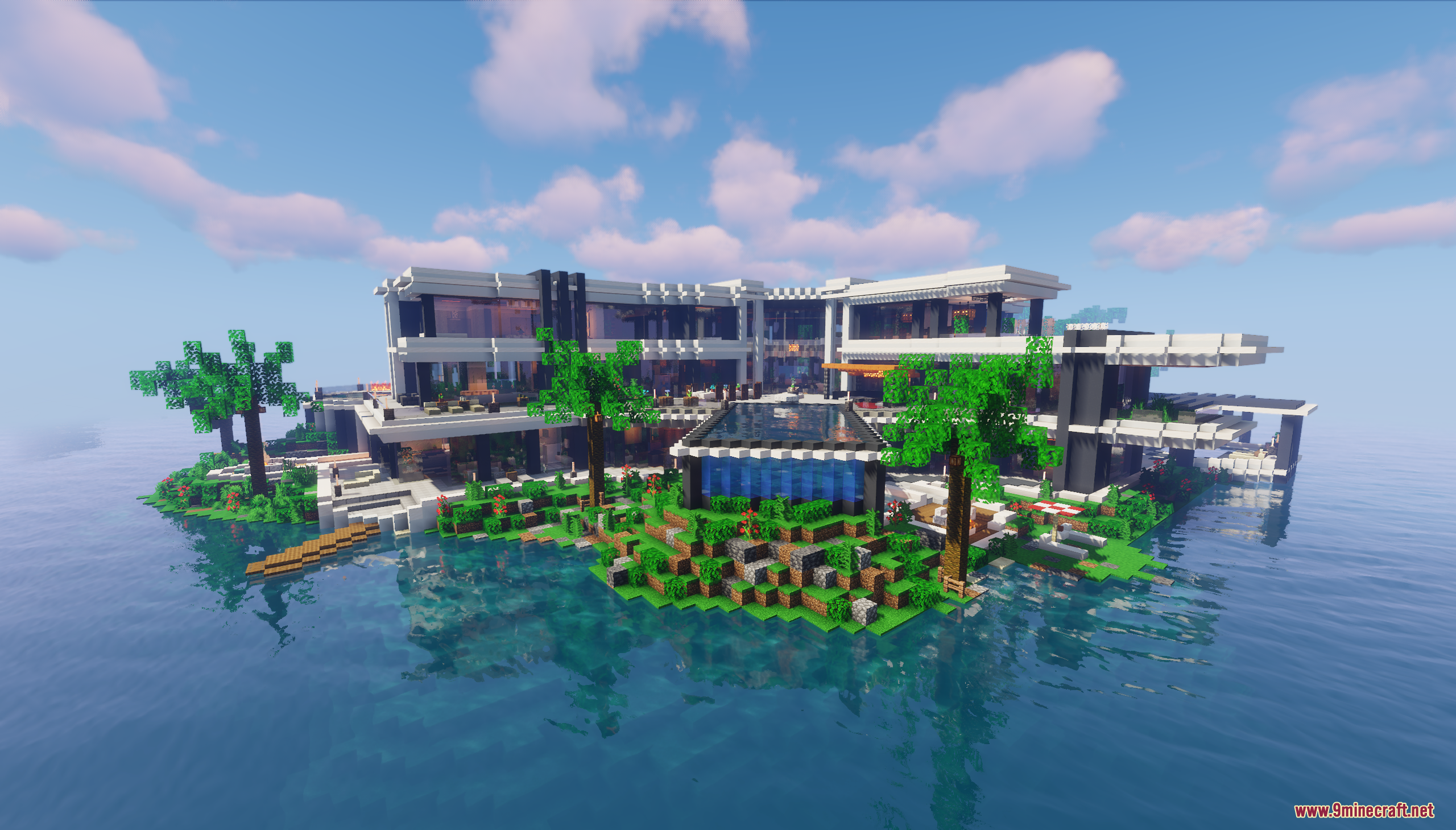 A modern mansion sits on a lush private tropical island