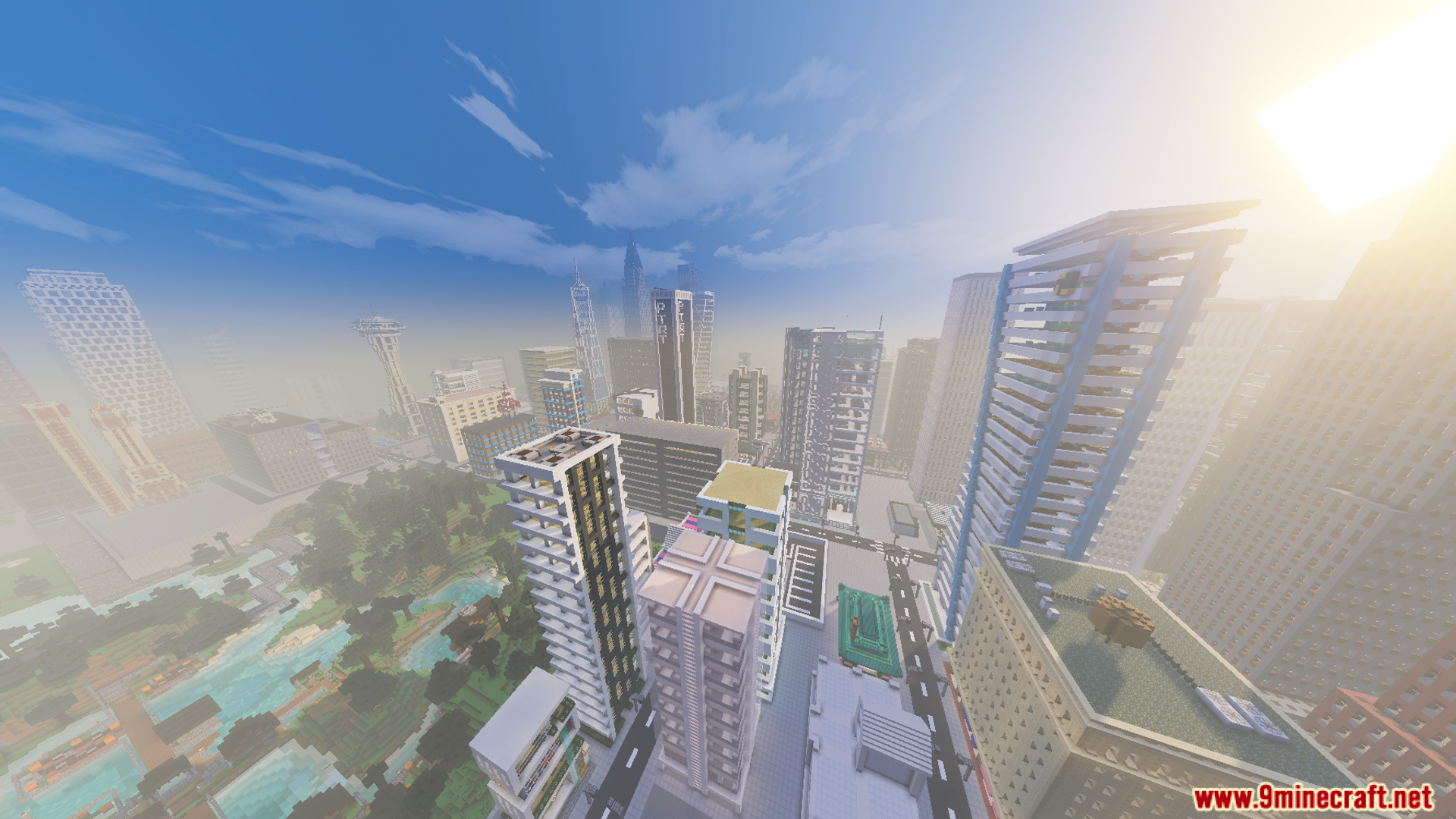 Aerial view of a sprawling city with skyscrapers and a river